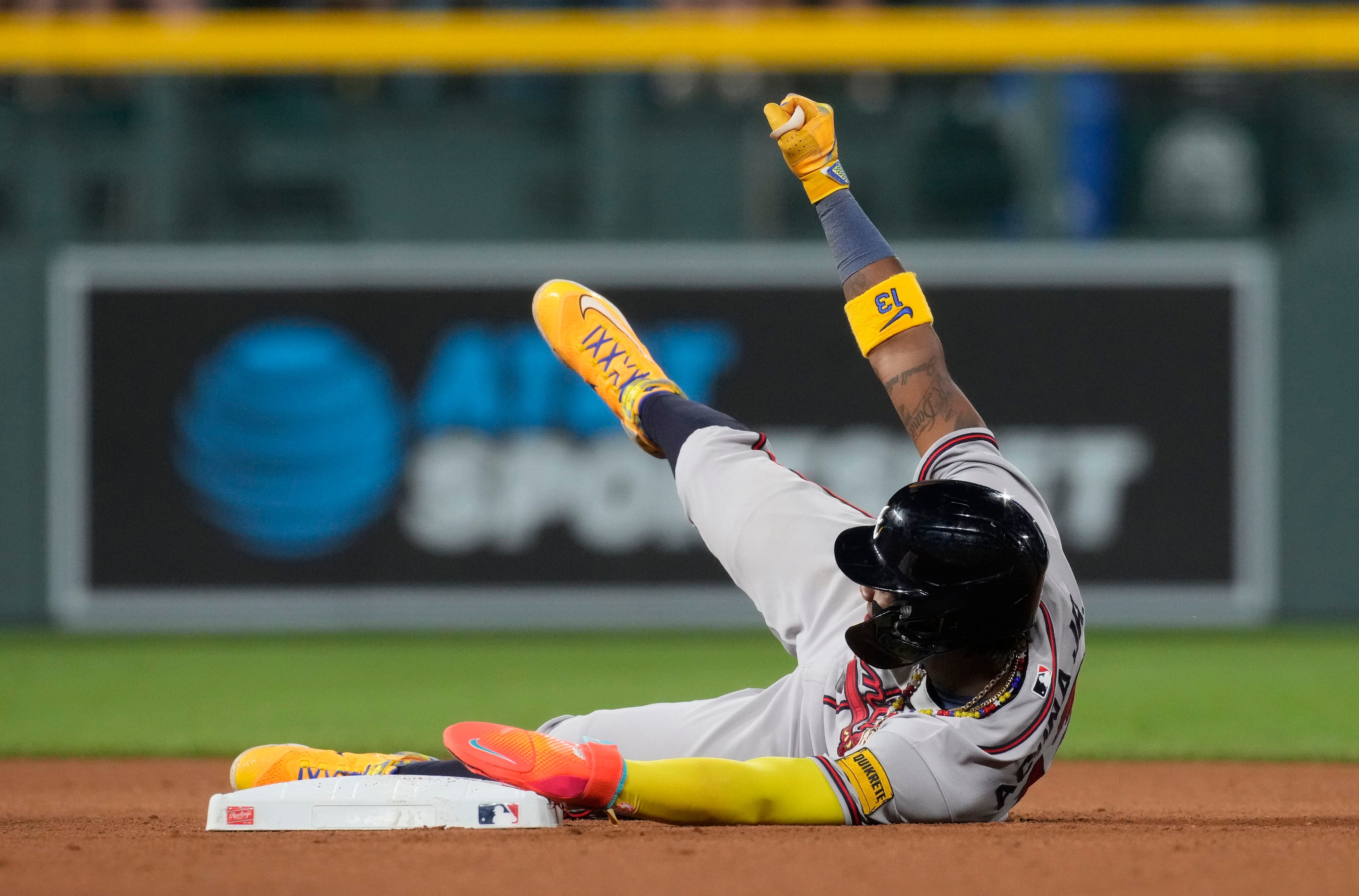 Ronald Acuña Jr. knocked over by fan charging field in Colorado