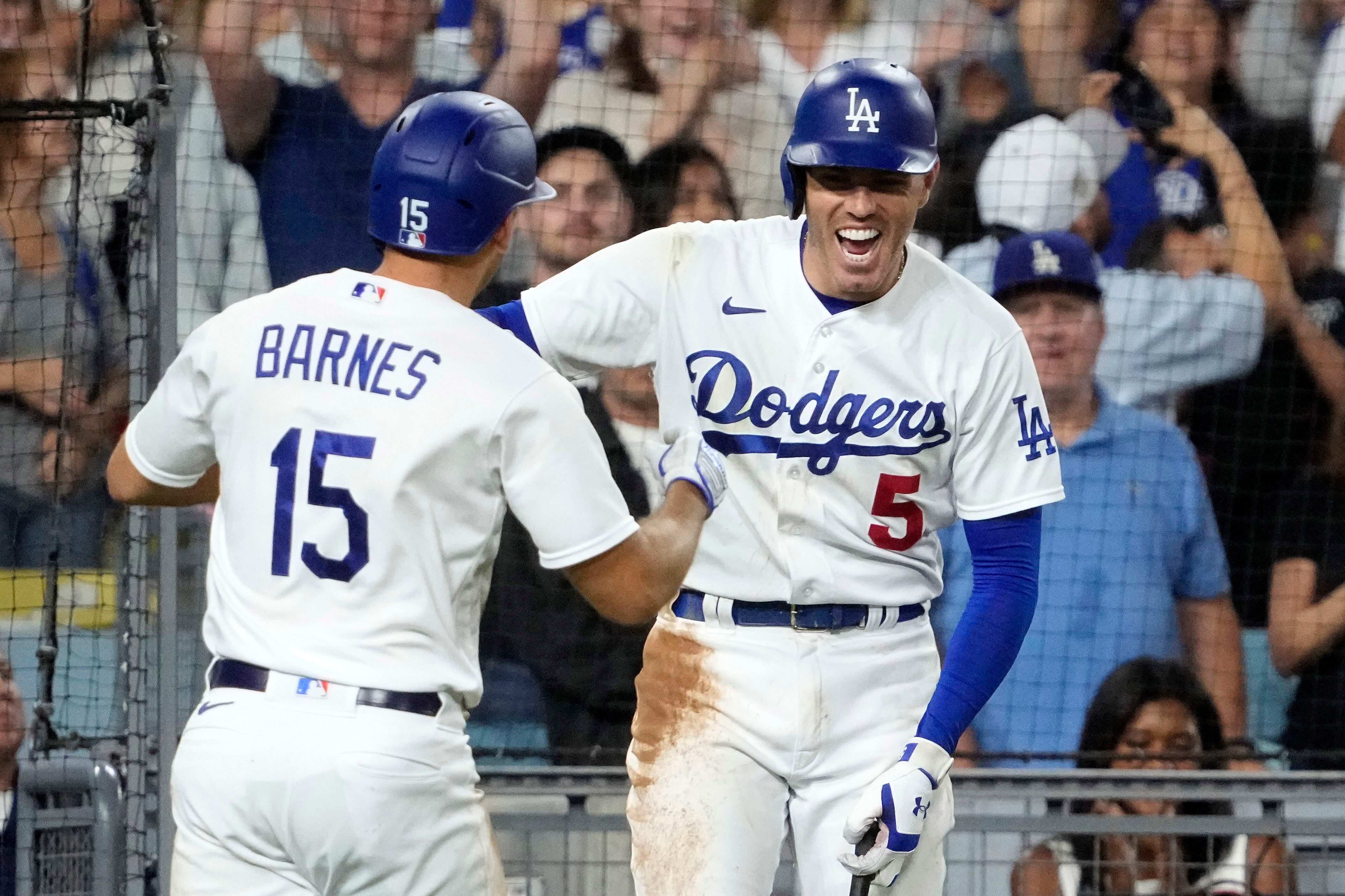 Milwaukee Brewers catcher William Contreras, left, congratulates