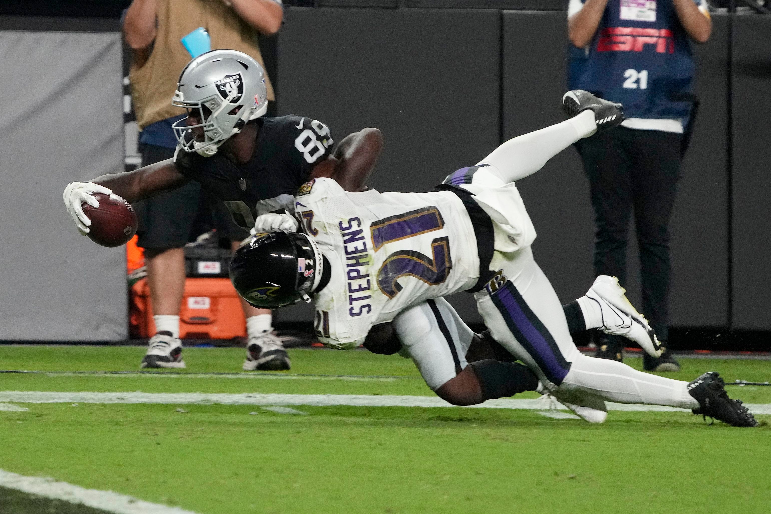 Carr's TD pass caps Raiders rally past Ravens 33-27 in OT - WTOP News