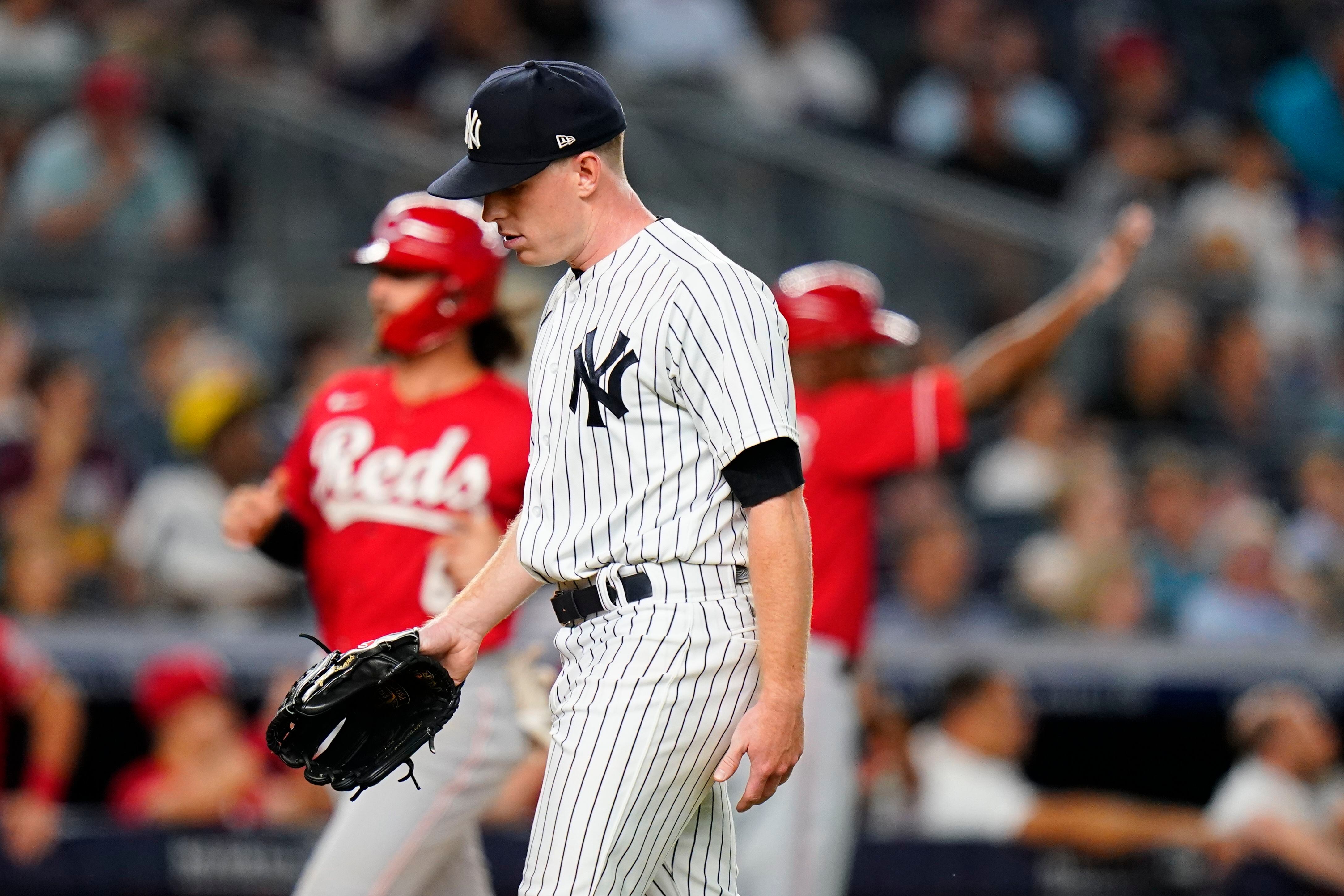 Birthday boy LeMahieu scores in 10th, Yanks beat Reds 7-6