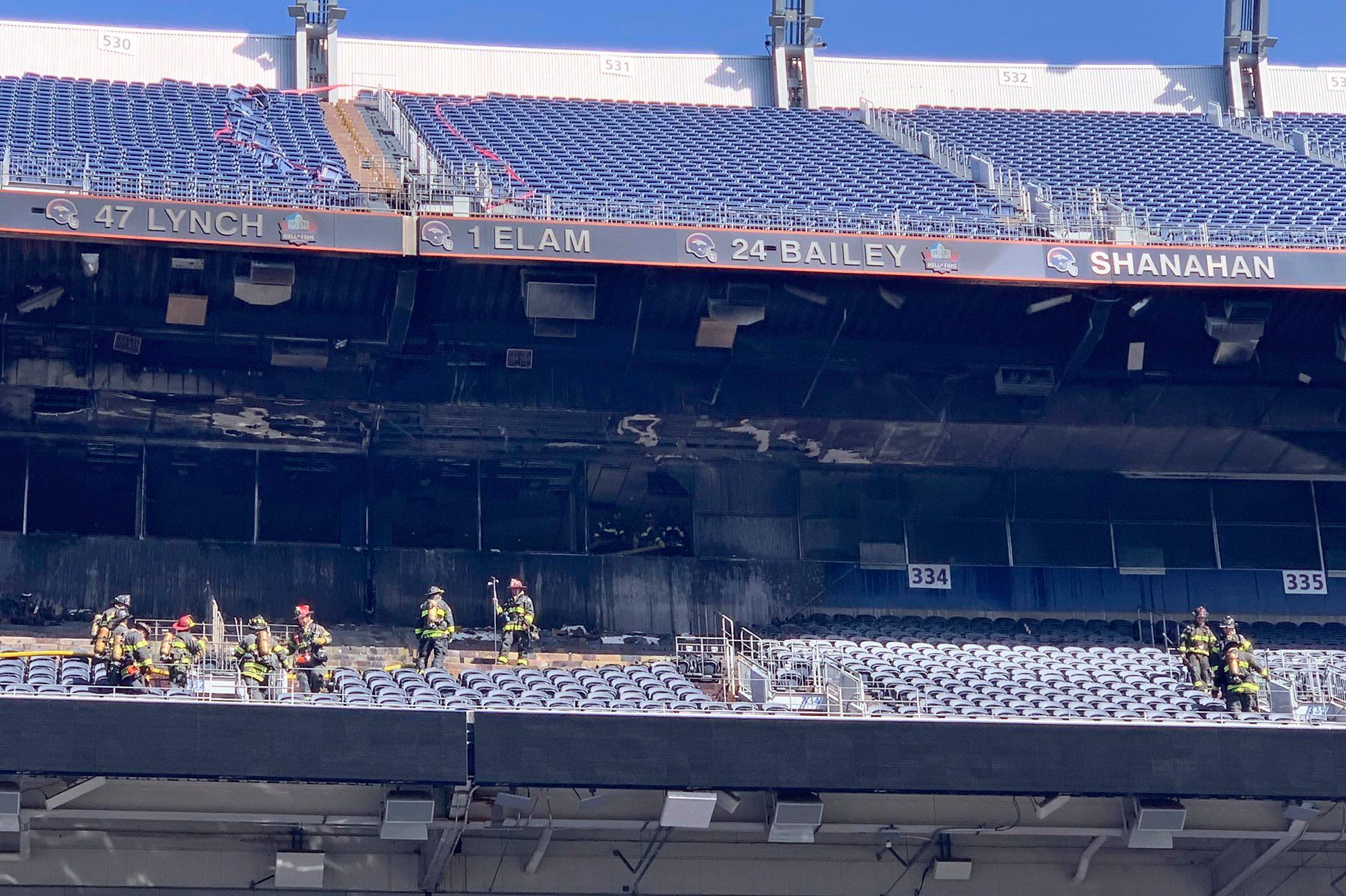 Fire Burns Seats Inside Of Empower Field At Mile High