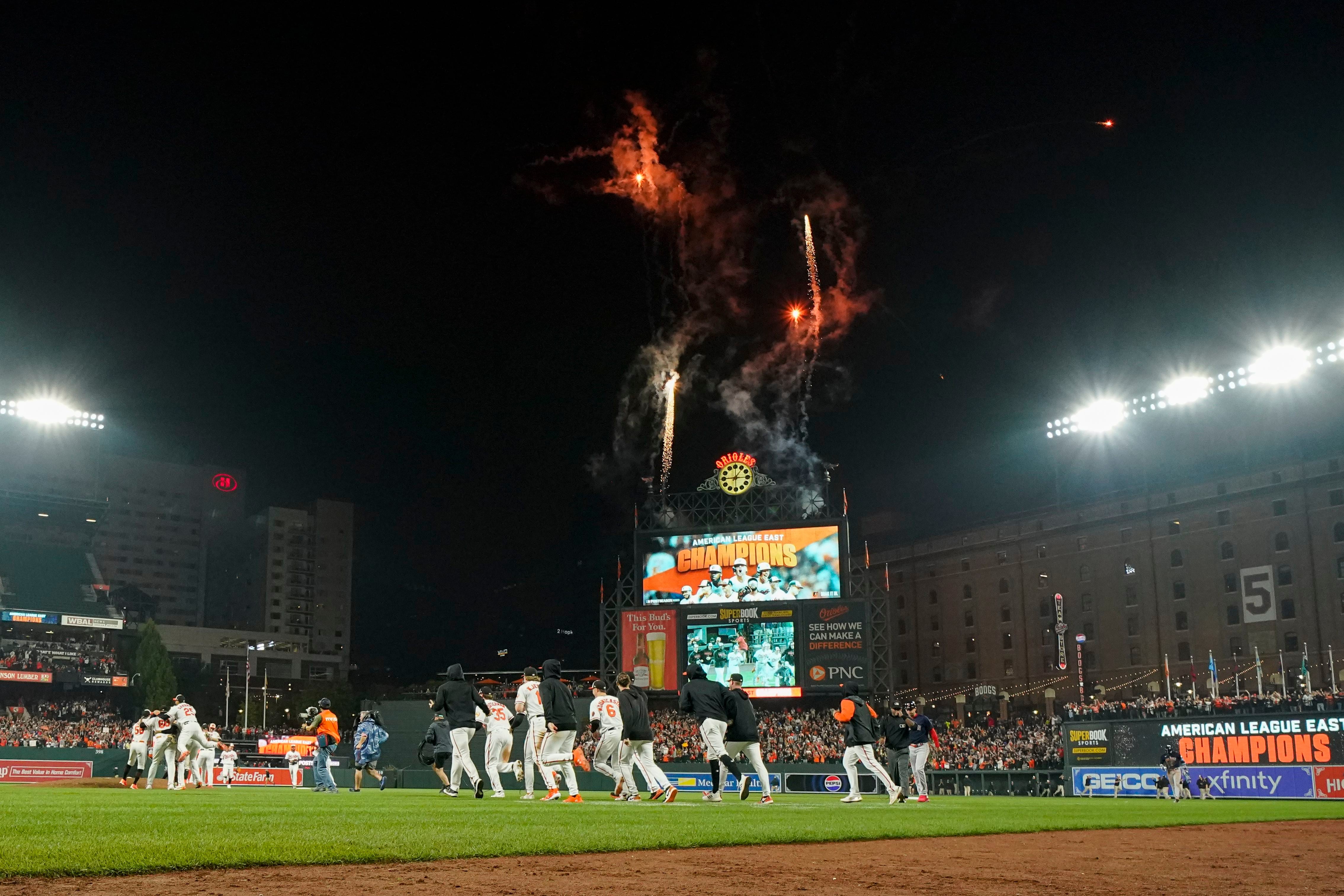 The clock atop the scoreboard at Oriole Park at Camden Yards is visible in  the first inning of a baseball game between the Baltimore Orioles and the  Boston Red Sox, Wednesday, April