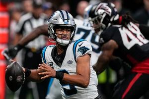 Bijan Robinson outshines top pick Bryce Young as Falcons knock off Panthers  24-10