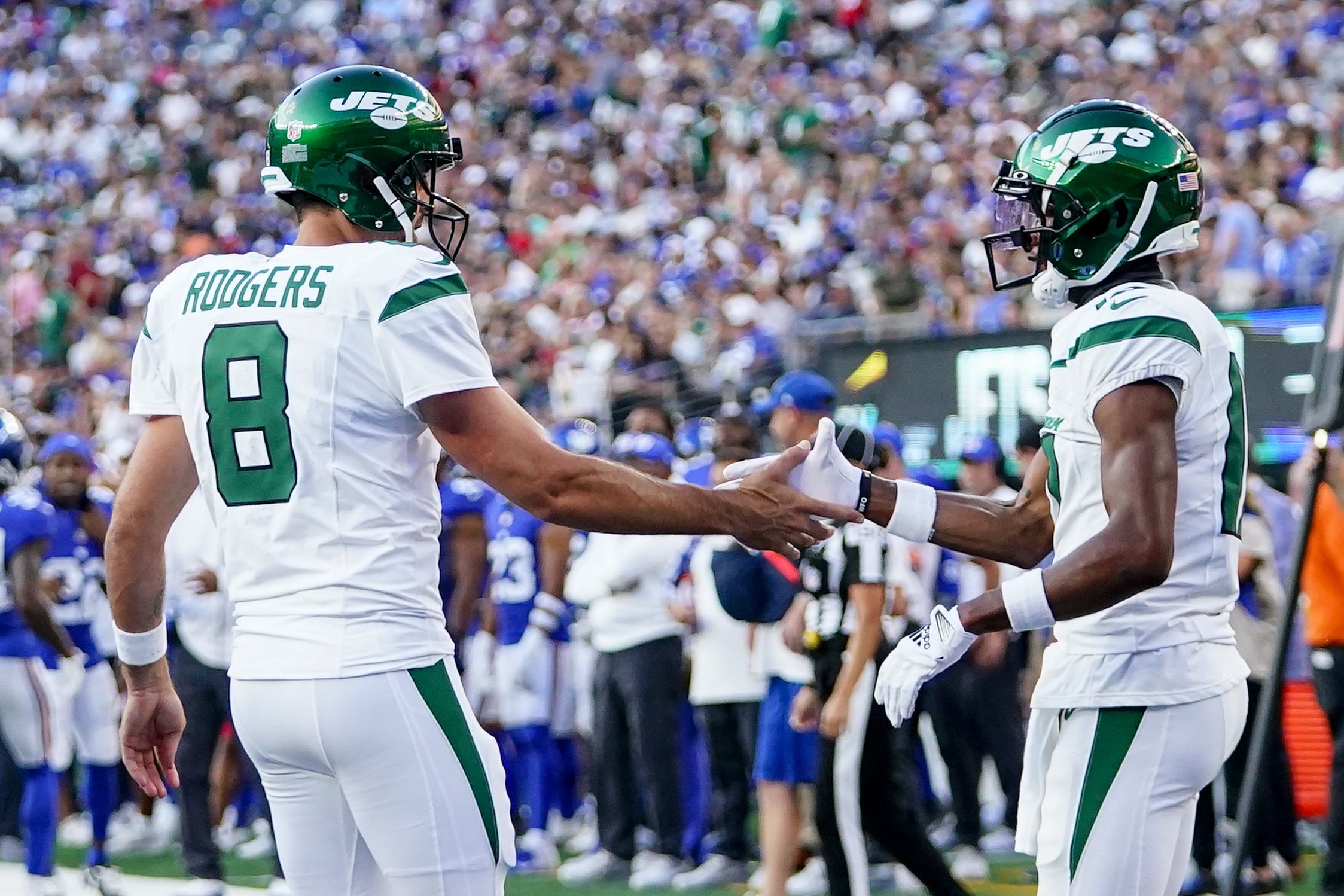 New York Jets wide receiver Garrett Wilson (17) warms up before taking on  the Miami Dolphins during an NFL football game Sunday, Oct. 9, 2022, in  East Rutherford, N.J. (AP Photo/Adam Hunger