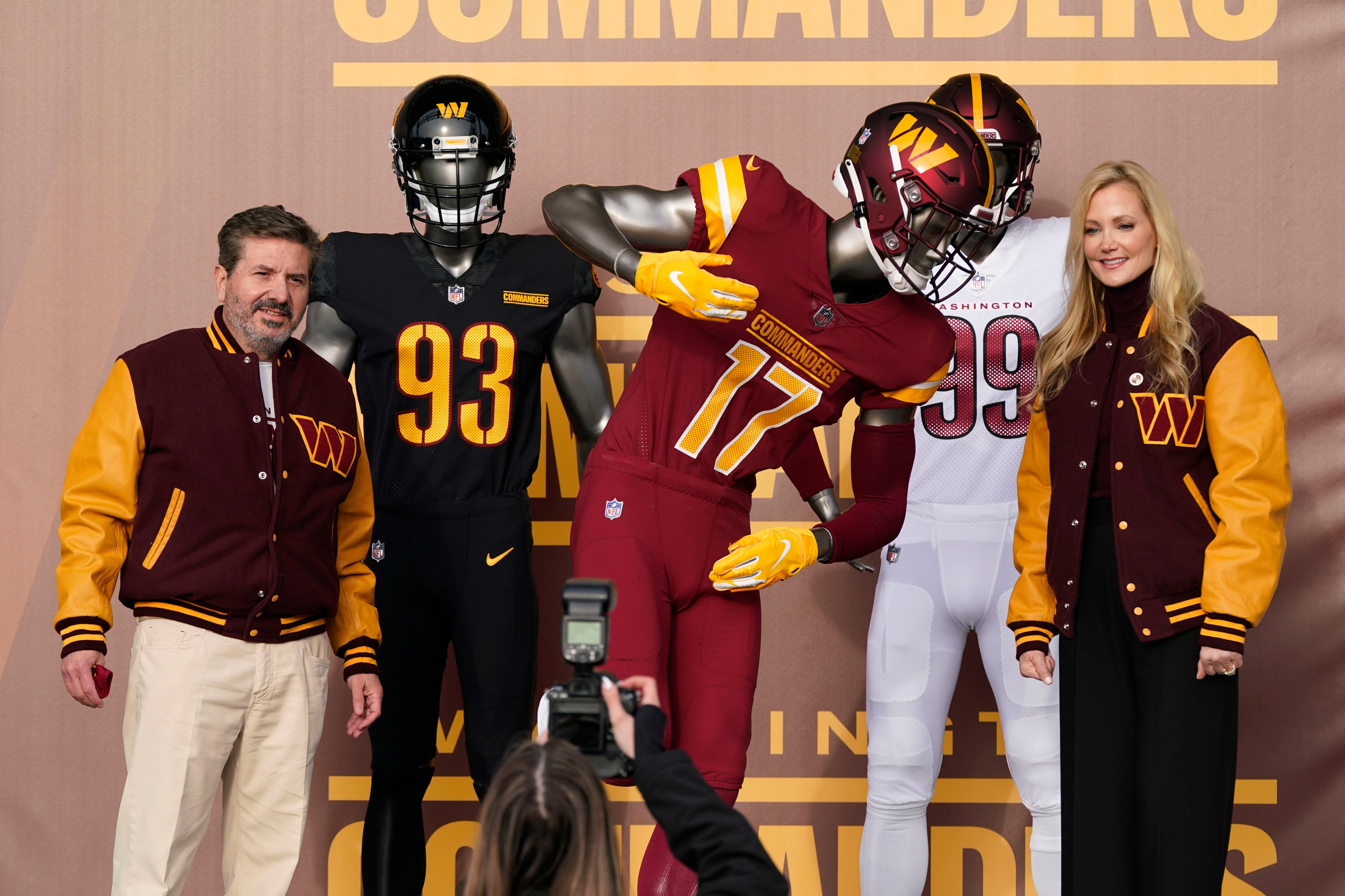 Washington Commanders jerseys are displayed at an event to unveil