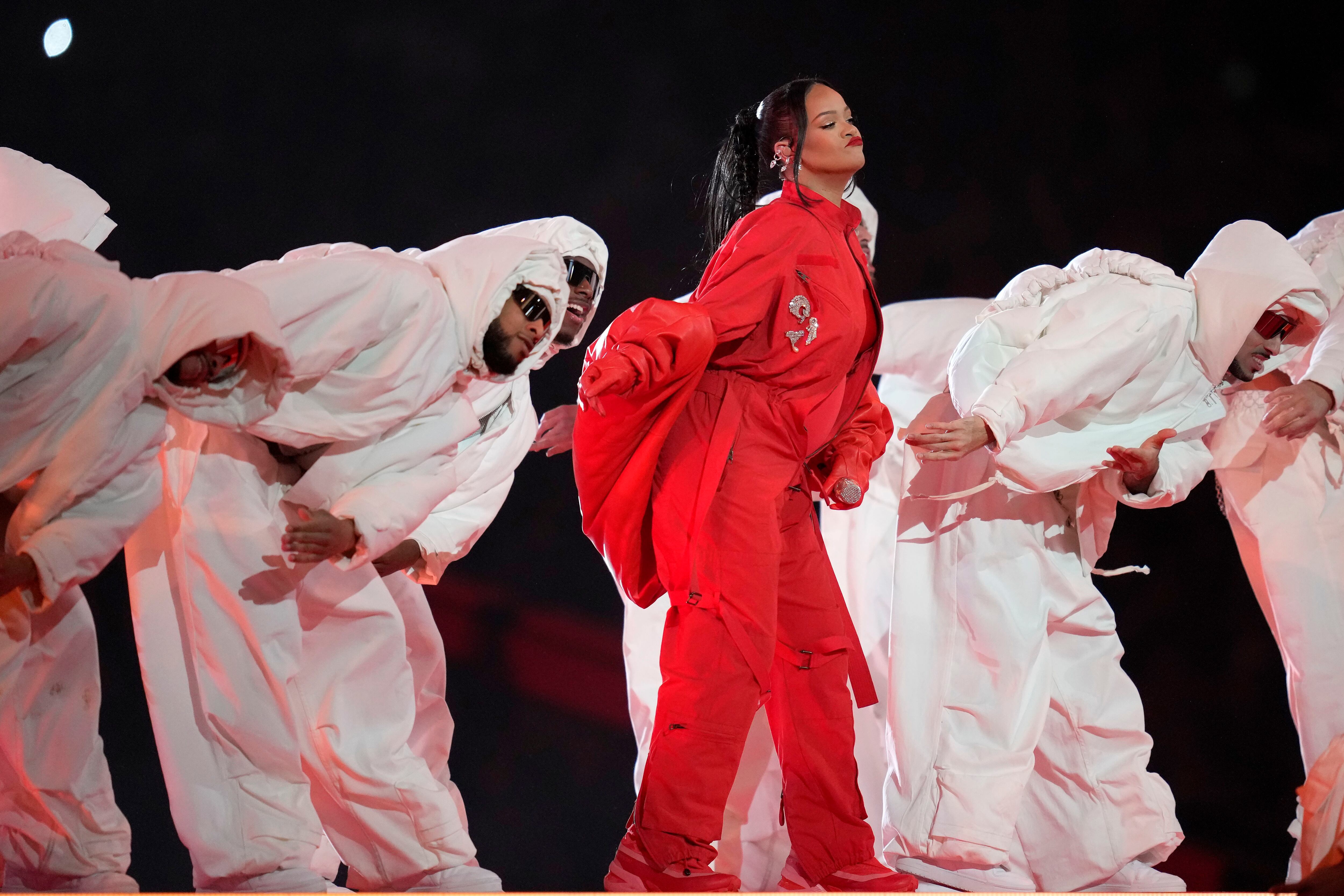 Rihanna Soars In Super Bowl Halftime Show; Reveals New Baby Bump