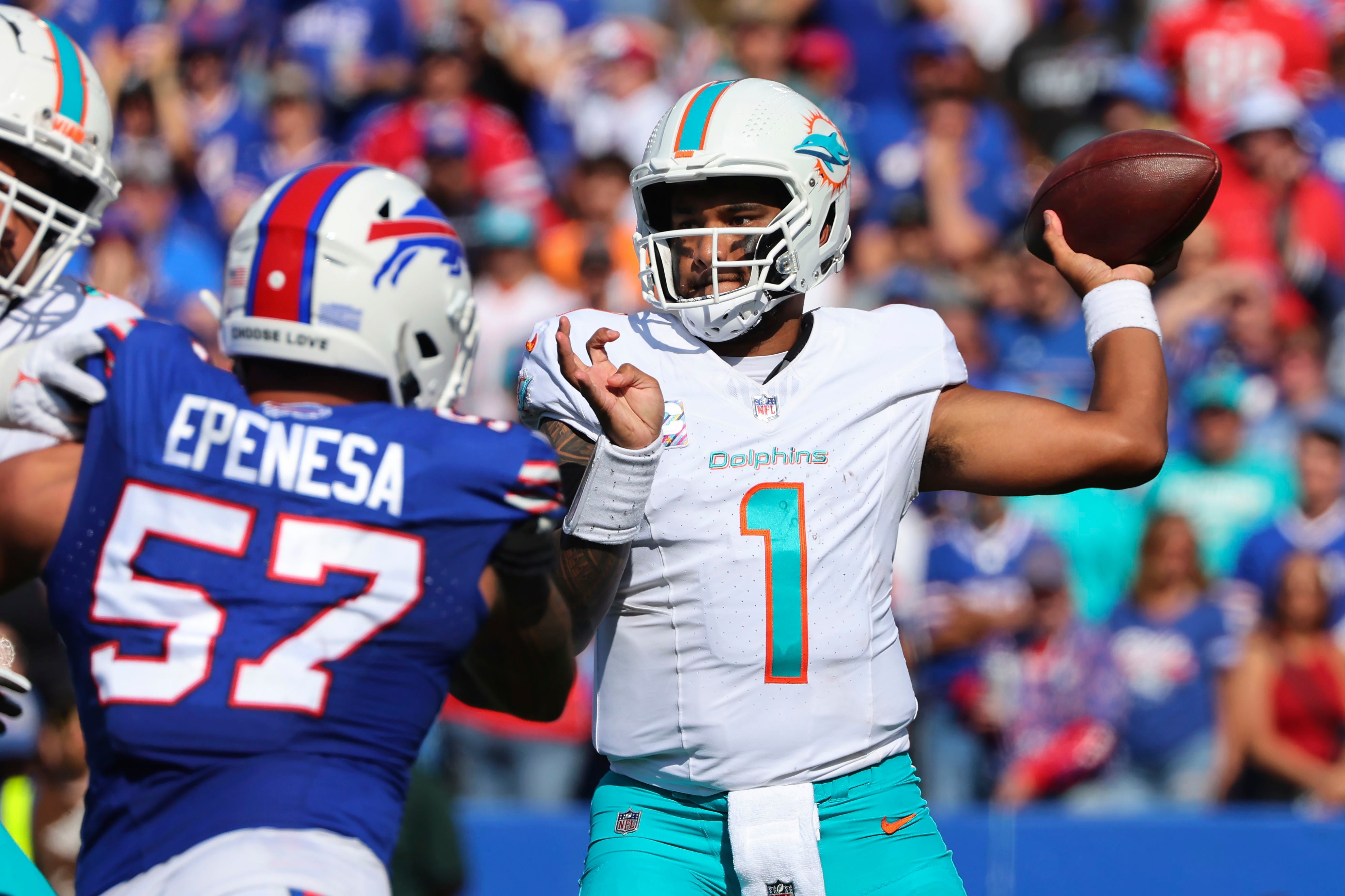 MIAMI GARDENS, FL - JULY 29: Miami Dolphins quarterback Too Tagovaloa (1)  listens to a coach in between drills during the Miami Dolphins training camp  on Friday, July 29, 2022 at Baptist