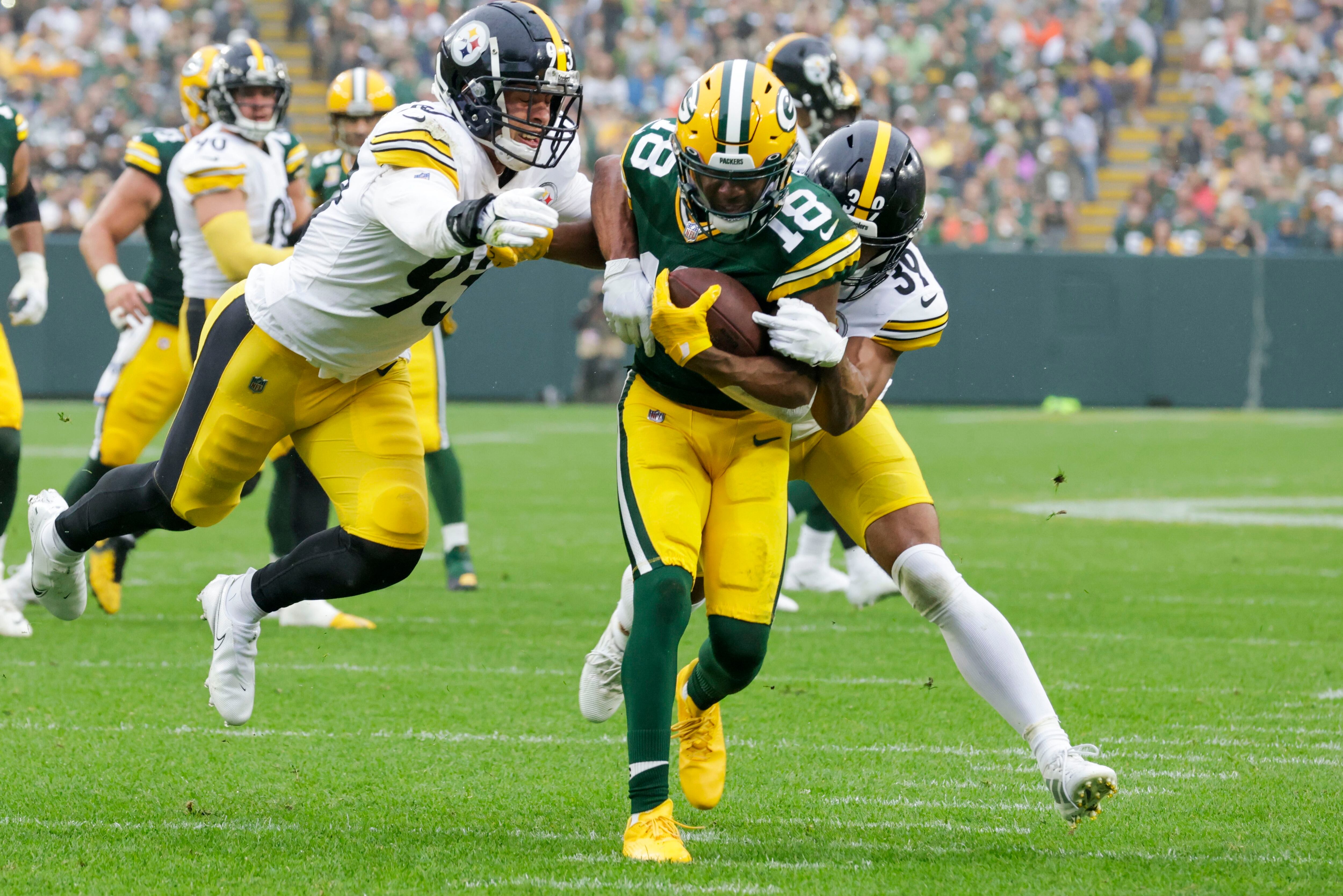 Packers thwart final-minute conversion attempt to survive Ravens