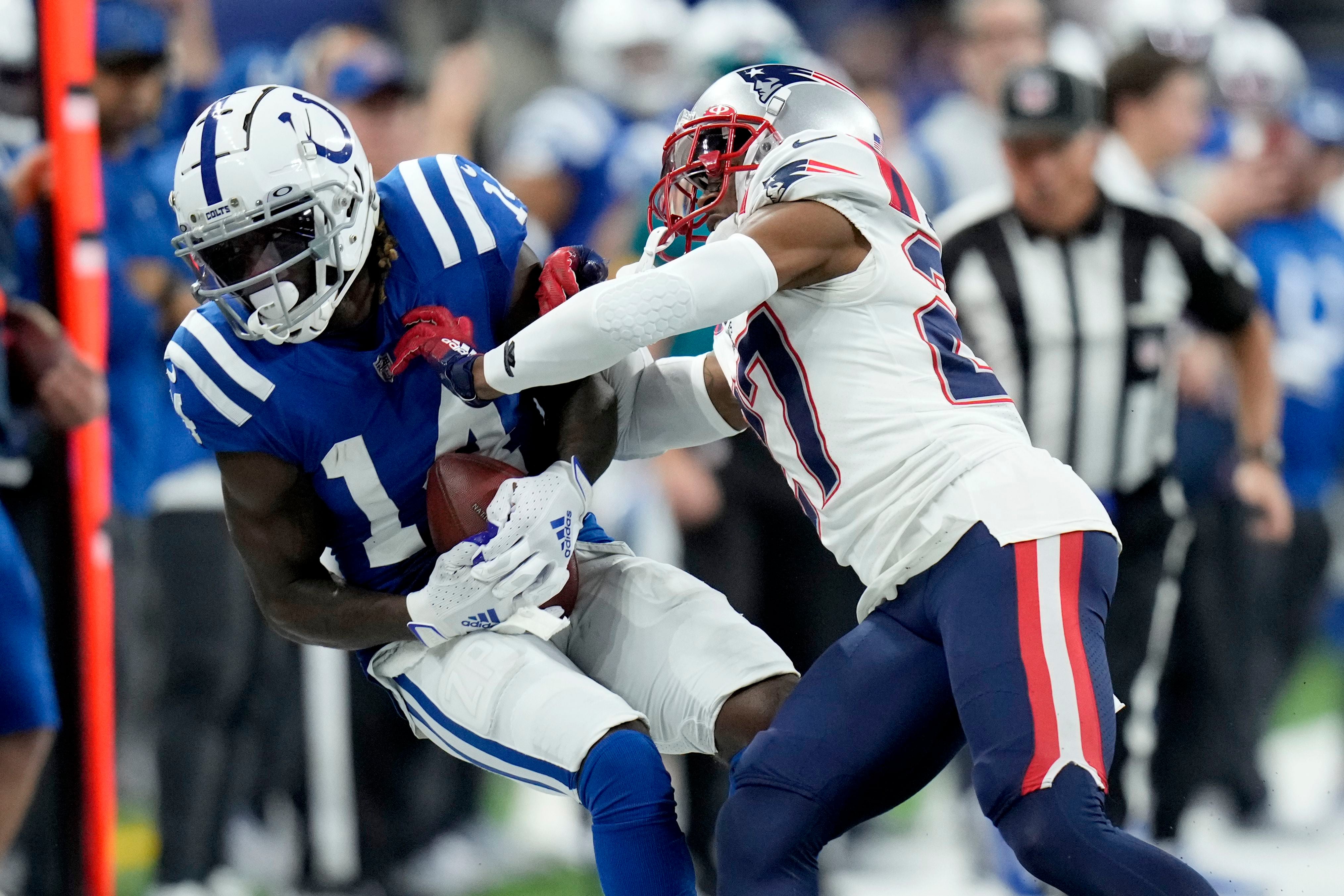 INDIANAPOLIS, IN - DECEMBER 18: Indianapolis Colts Running Back Nyheim  Hines (21) warms up for the NFL football game between the New England  Patriots and the Indianapolis Colts on December 18, 2021