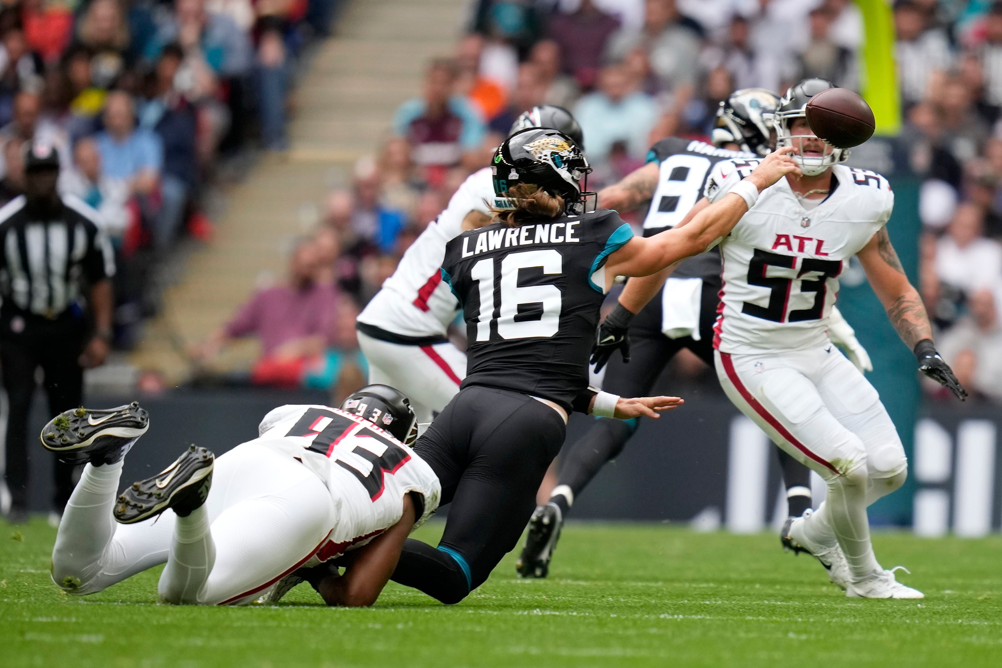 Lawrence, Ridley and defense help Jaguars beat Falcons 23-7 in London –  KXAN Austin