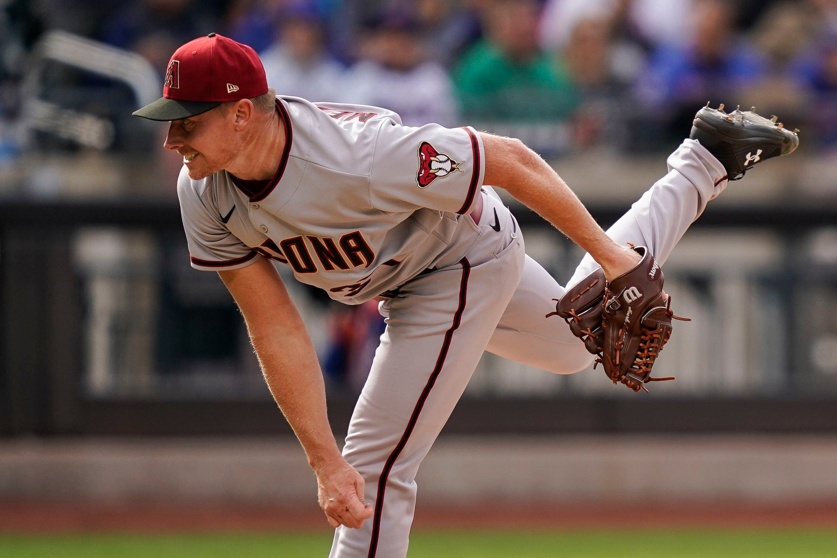 Arizona Diamondbacks left fielder David Peralta (6), second baseman Ketel  Marte (12), and center fielder Jake McCarthy (30) celebrate after closing  the ninth inning of a baseball game against the New York