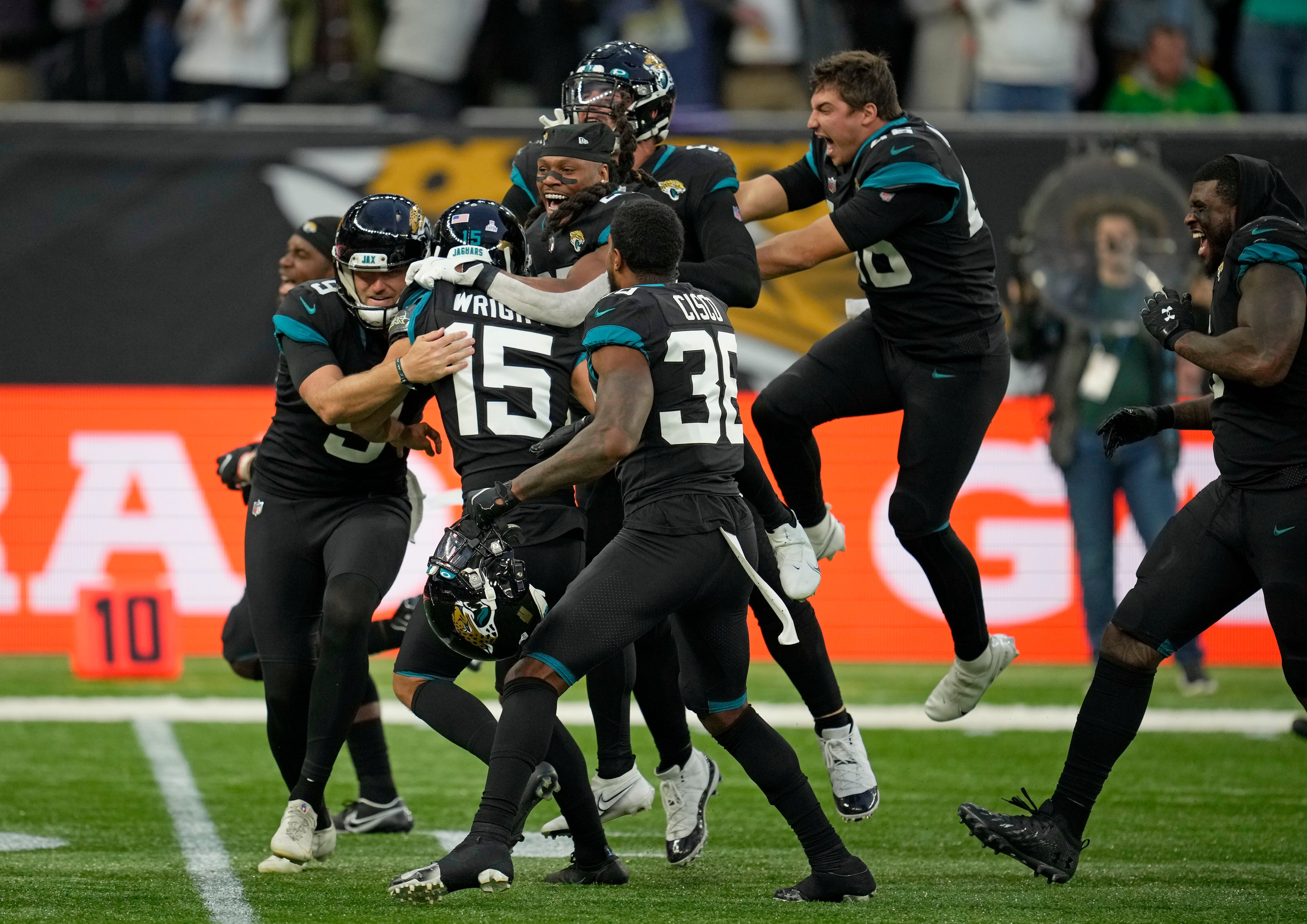 Miami Dolphins linebacker Jaelan Phillips (15) runs to the ball during the  second half of an NFL football game against the Jacksonville Jaguars at Tottenham  Hotspur Stadium in London, Sunday, Oct. 17