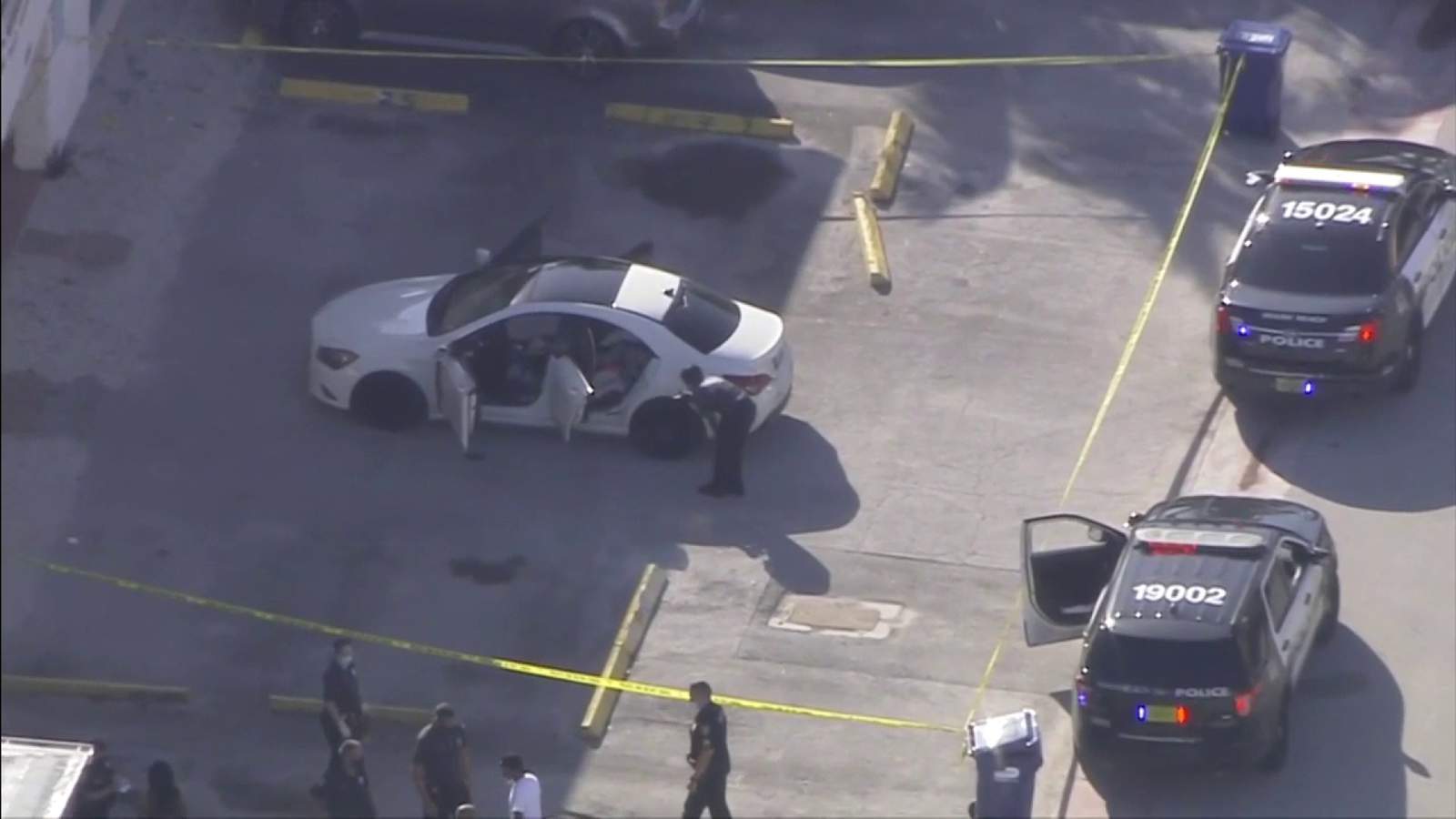 Police search for white BMW SUV after shots fired in Miami Beach