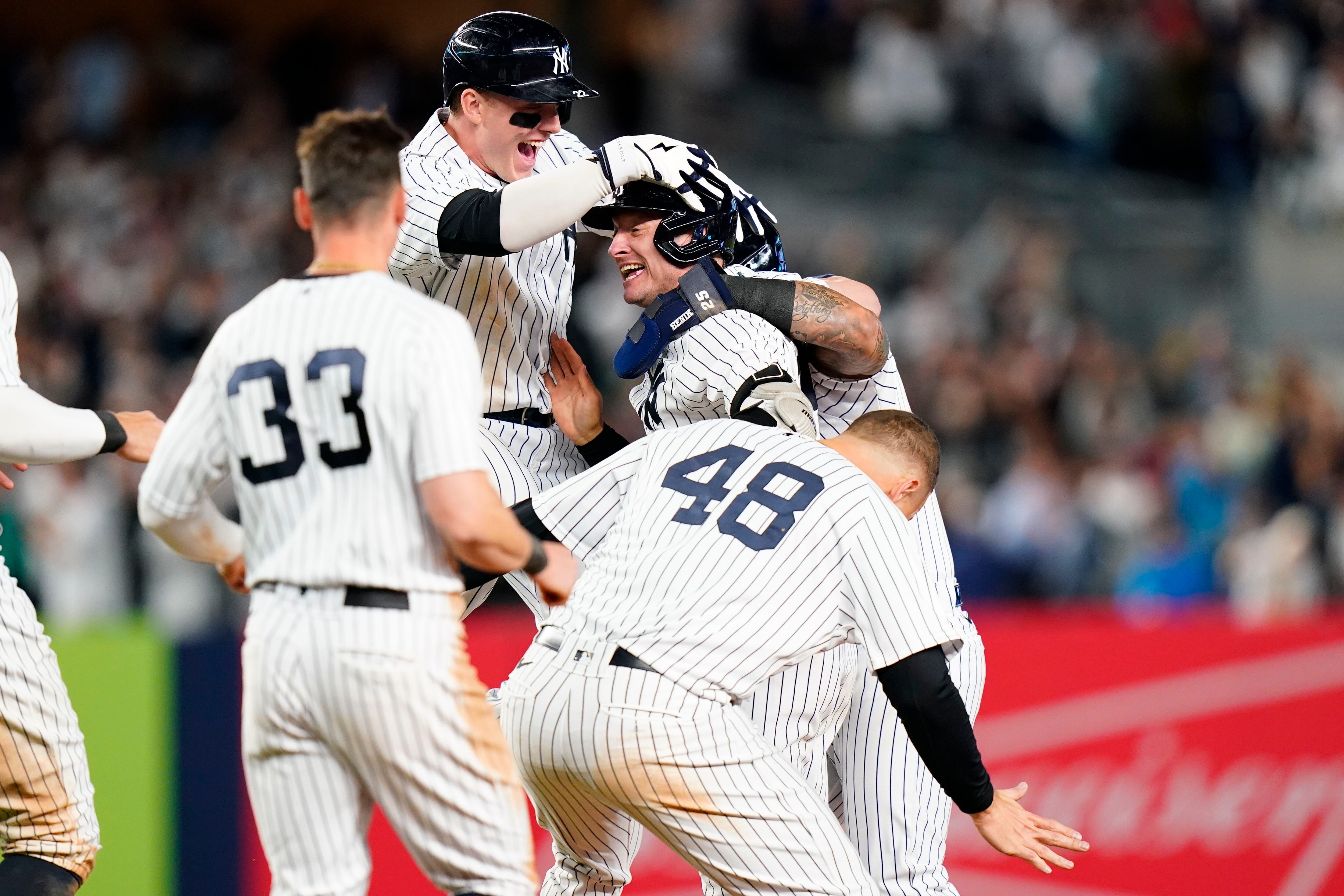 Judge falls just short of 61, Yanks clinch playoff berth with win over Red  Sox