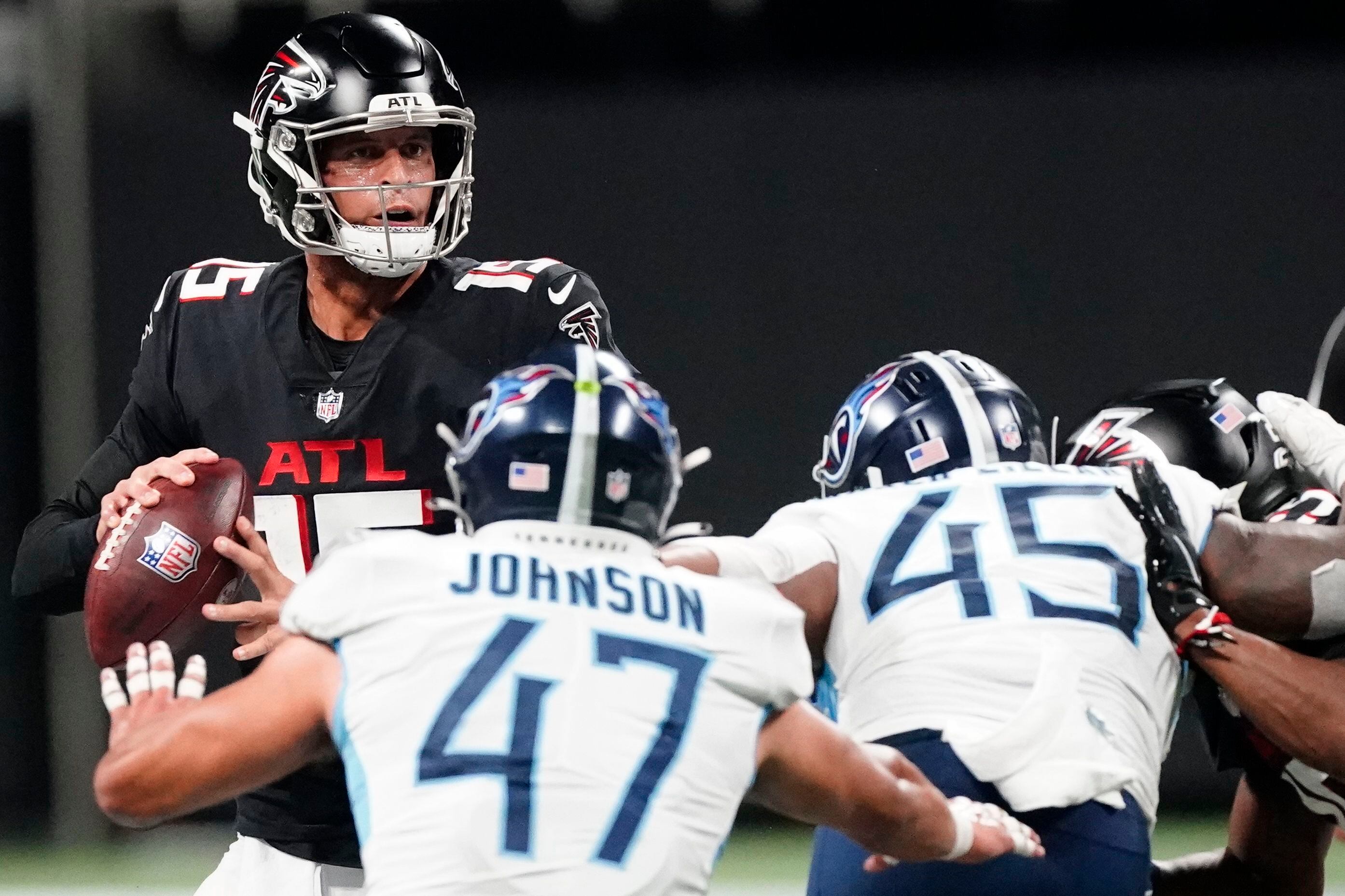 Atlanta Falcons quarterback Logan Woodside (11) runs with the ball