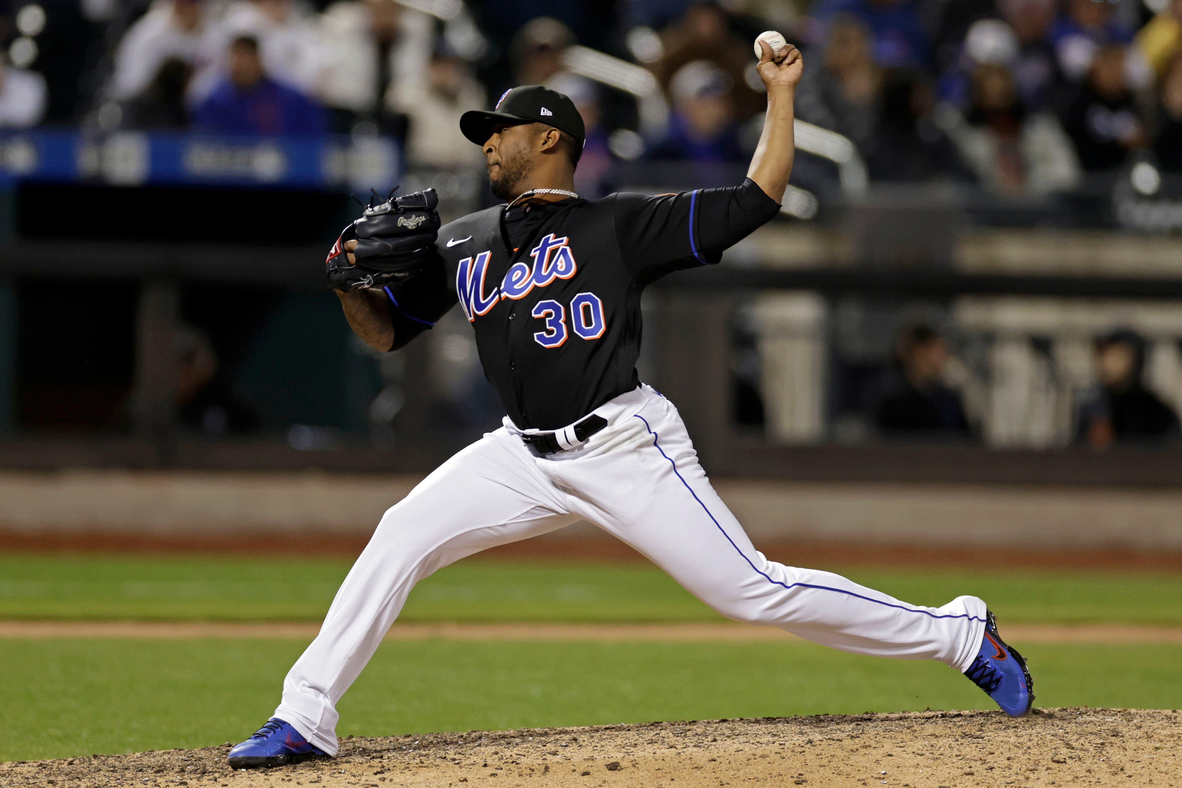 New York Mets relief pitcher Joely Rodriguez (30) pitches in the