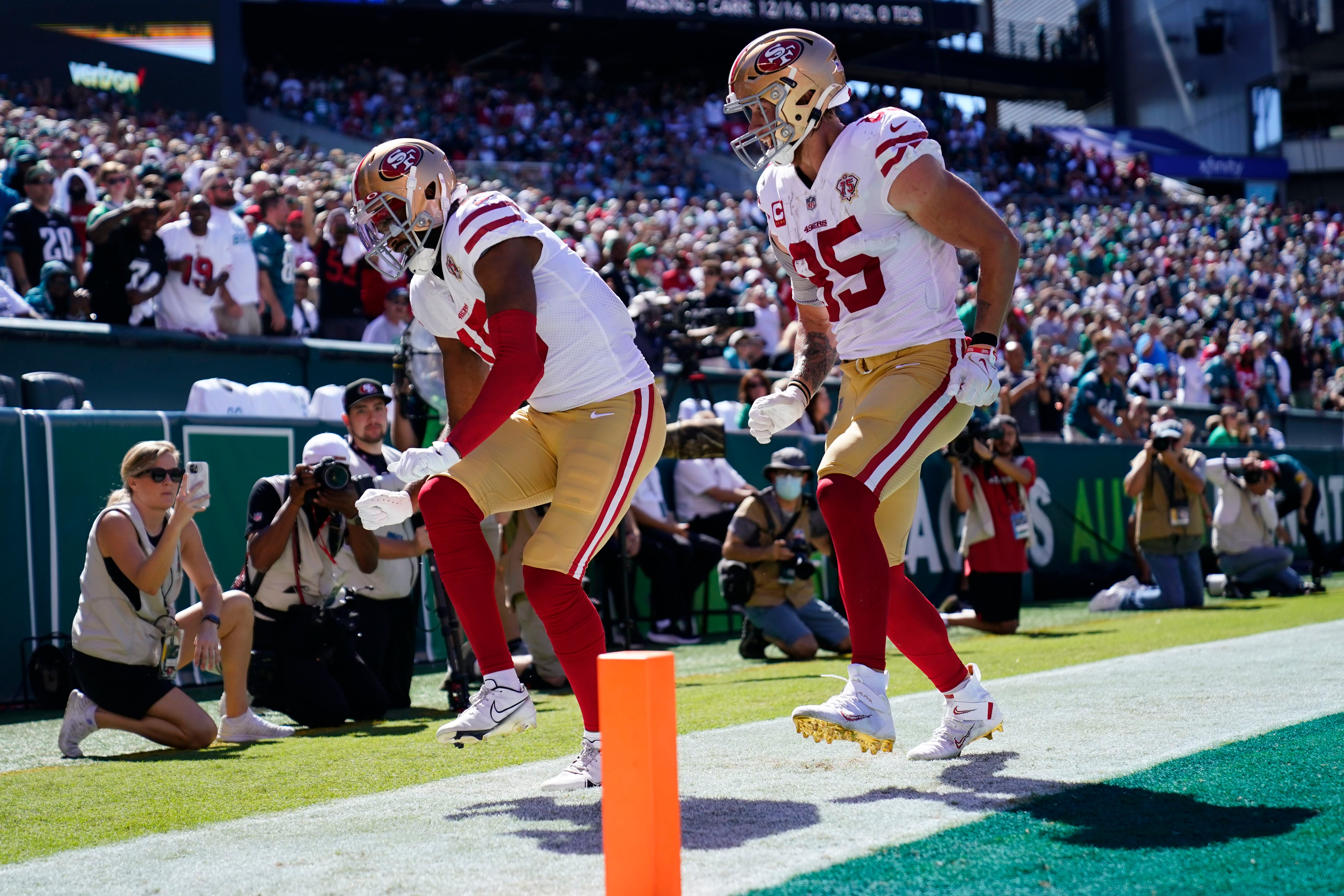 George Kittle celebrates 49ers' win with topless Jimmy G shirt