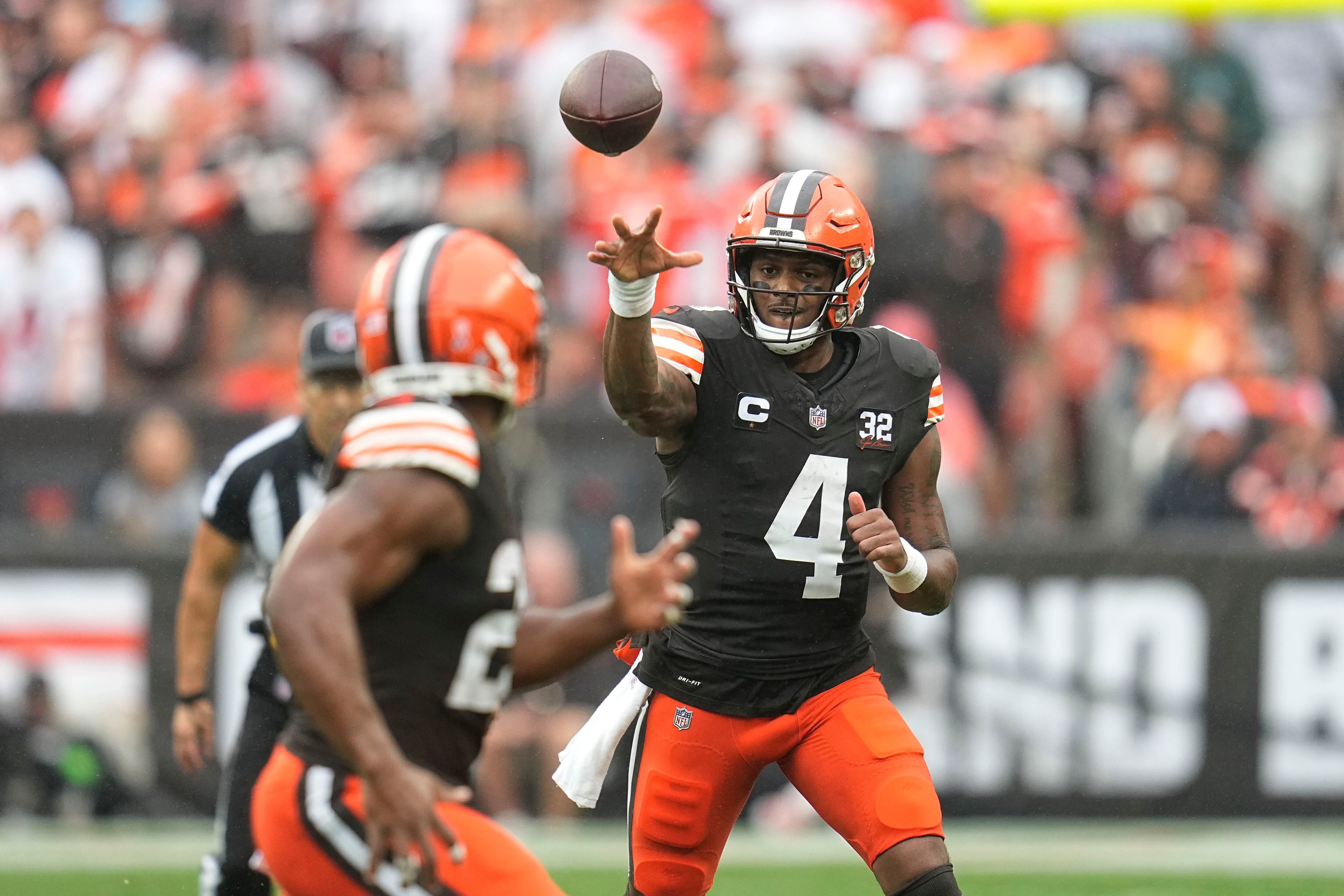 CLEVELAND, OH - DECEMBER 24: Cleveland Browns quarterback Deshaun Watson  (4) looks to pass during the second quarter of the National Football League  game between the New Orleans Saints and Cleveland Browns