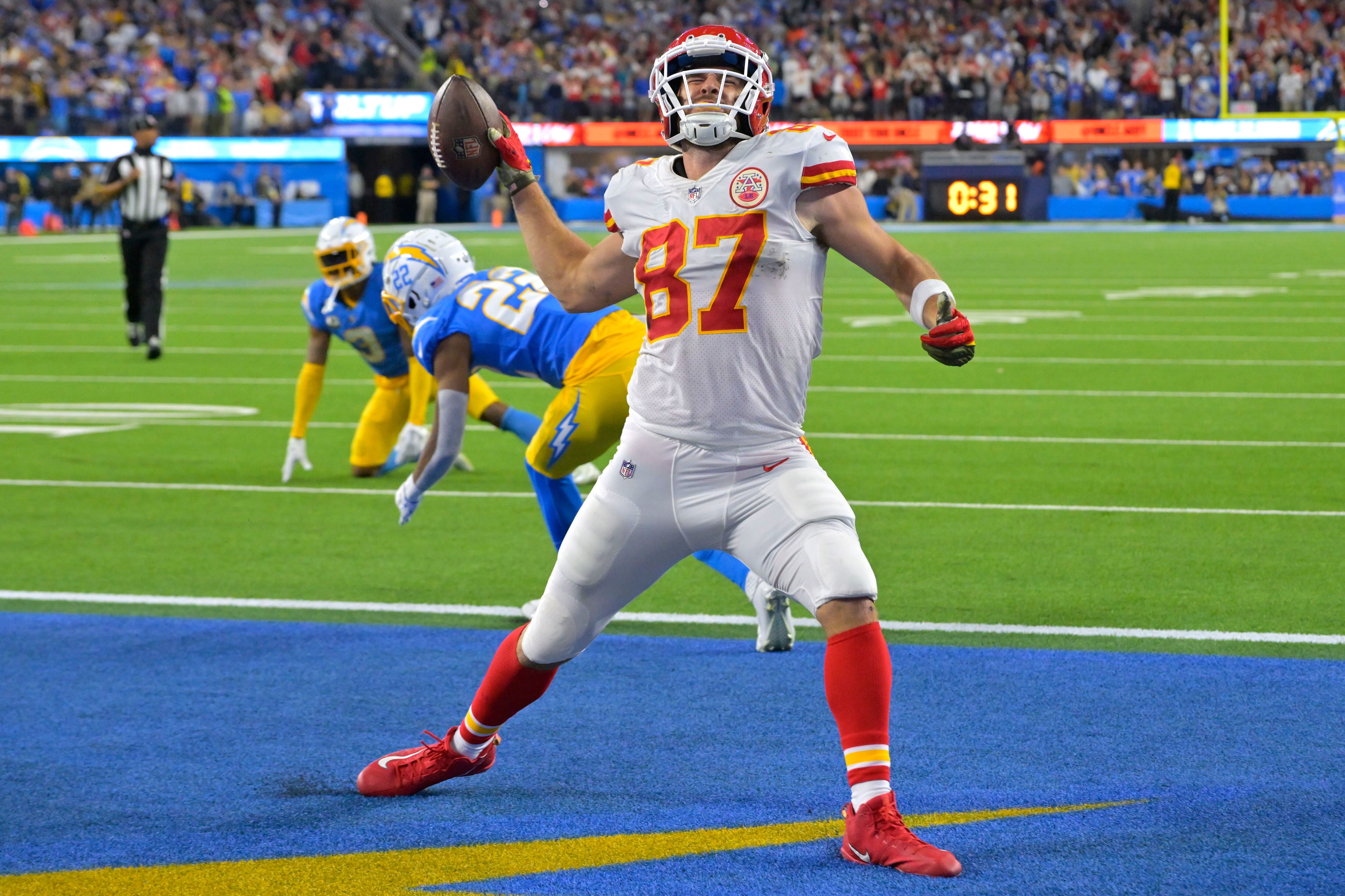 October 2, 2022: Los Angeles Chargers running back Austin Ekeler (30) runs  for a touchdown after making a catch during the 4th quarter of an NFL  football game between the Los Angeles