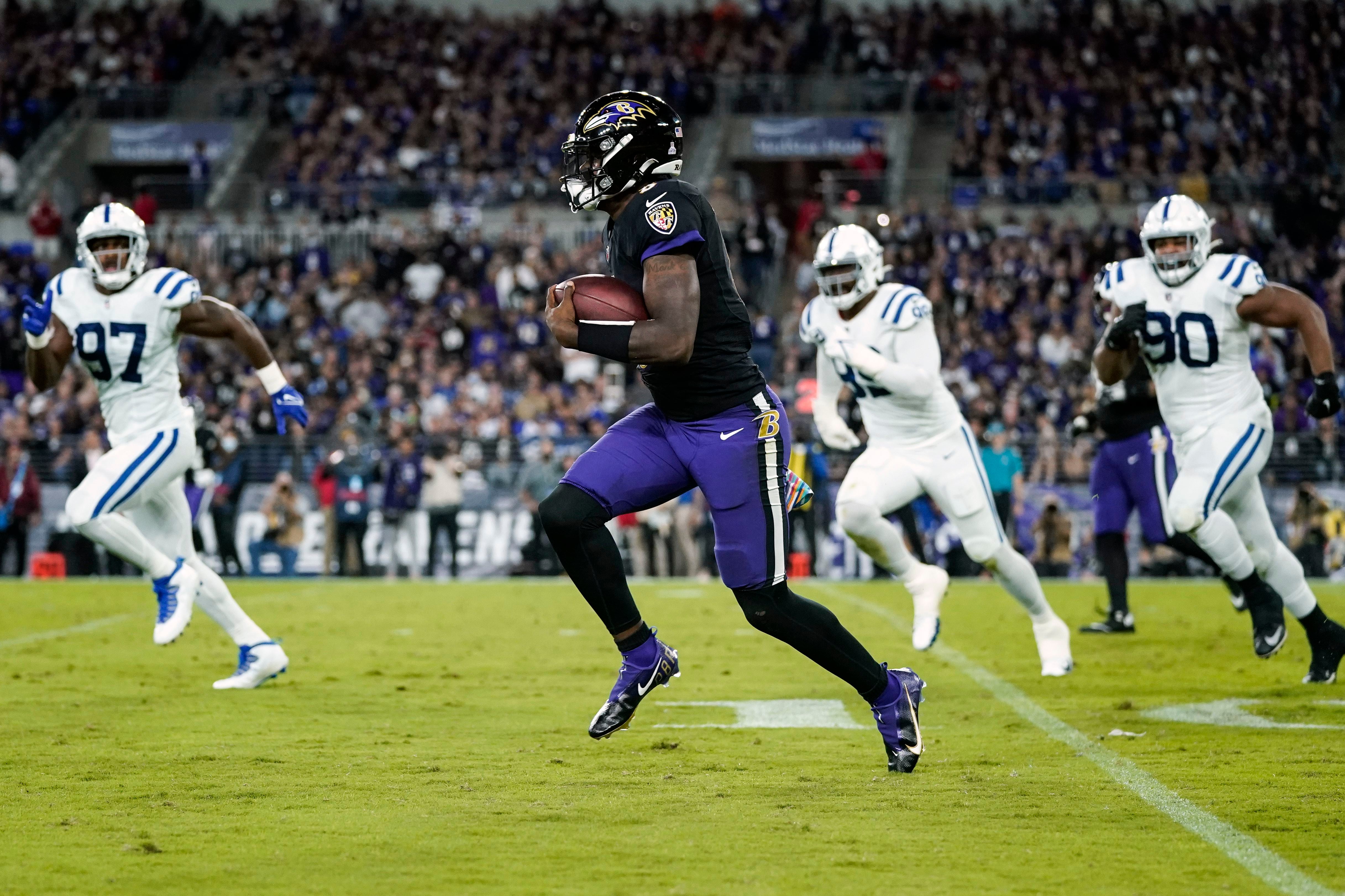 Isaiah Rodgers of the Indianapolis Colts scores a touchdown on a kick