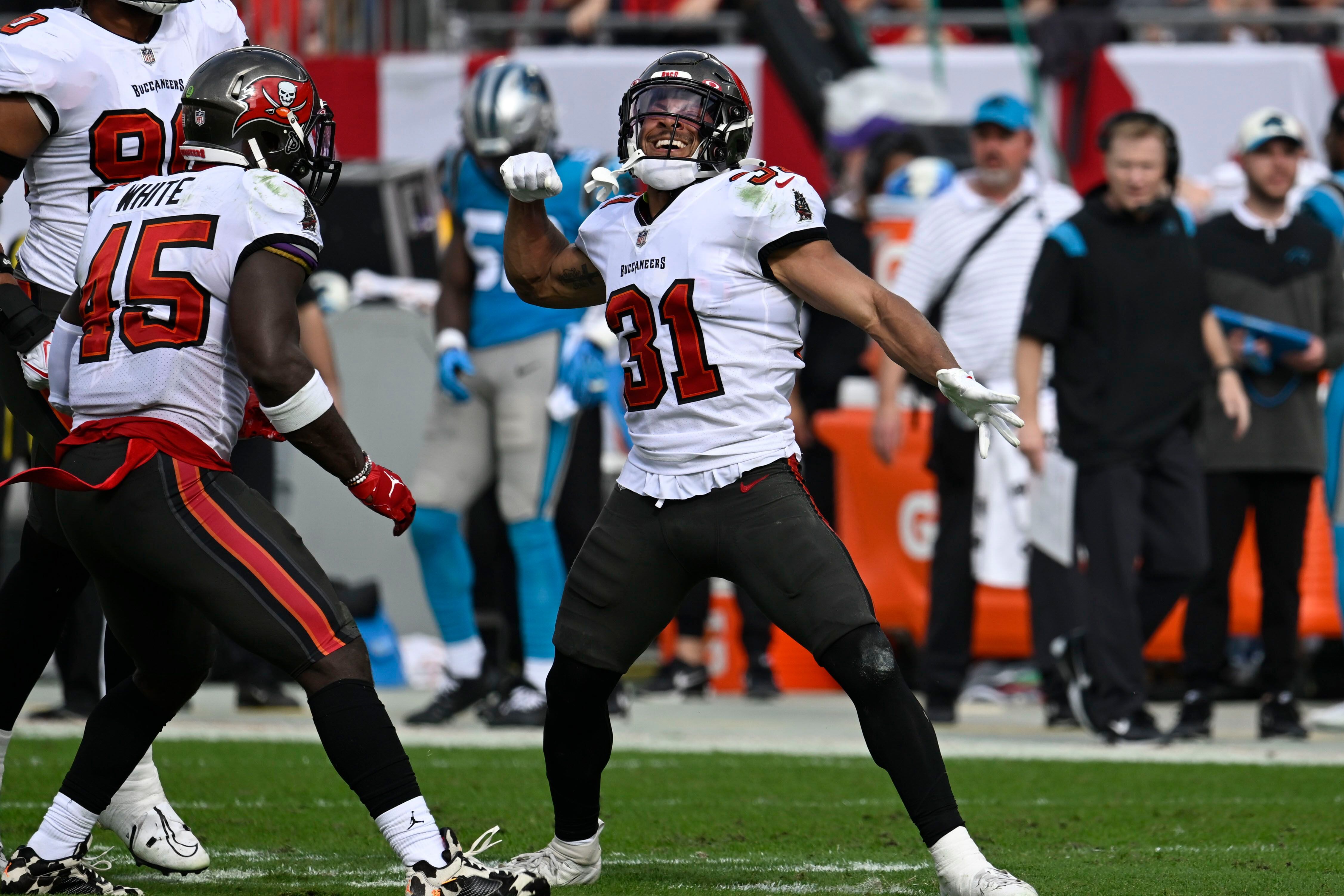 Tom Brady, Bucs rally to beat Panthers 30-24, clinch NFC South