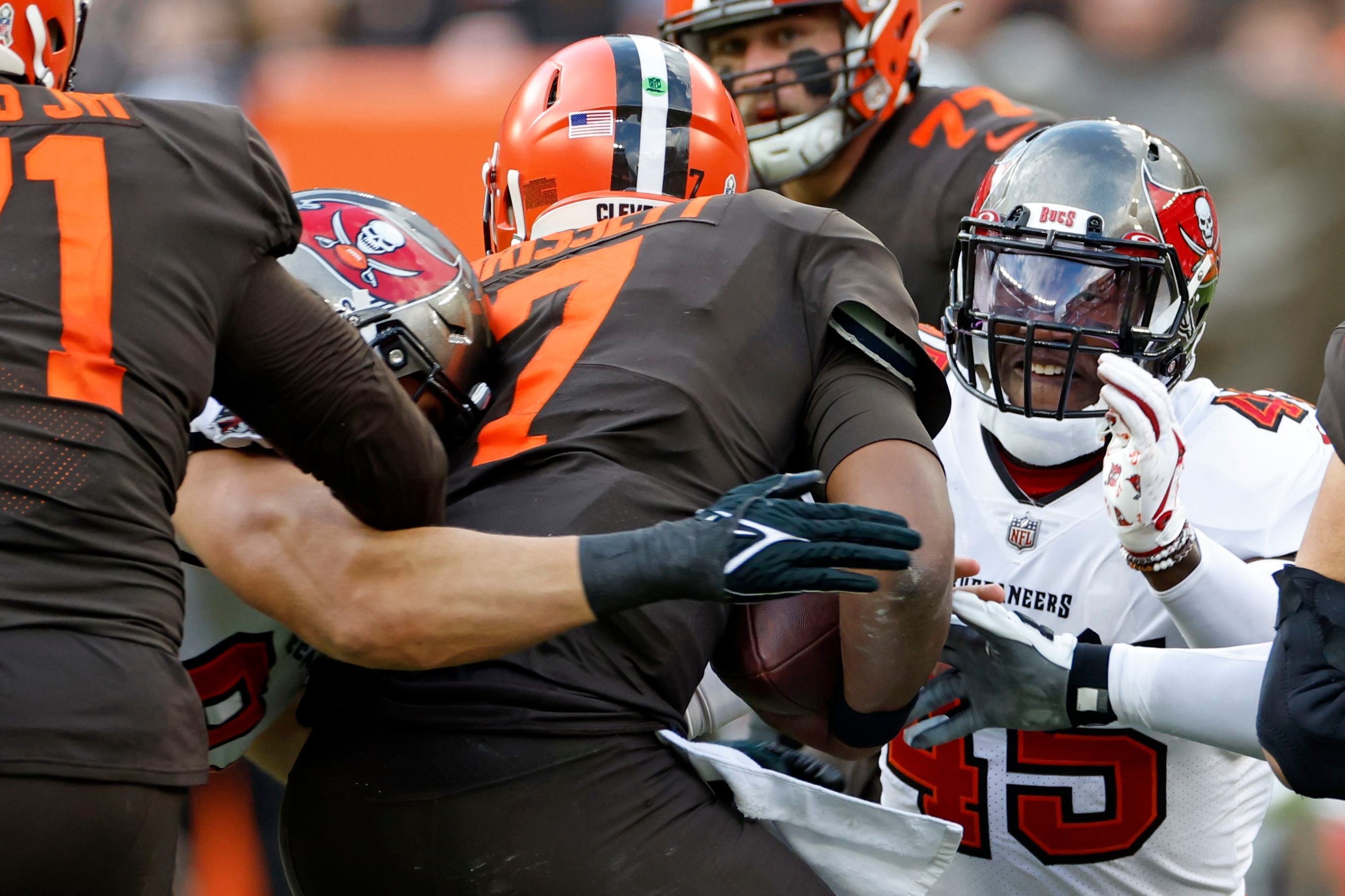 Cleveland Browns defensive end Myles Garrett (95) celebrates after sacking Tampa  Bay Buccaneers quarterback Tom Brady (12) during the second half of an NFL  football game in Cleveland, Sunday, Nov. 27, 2022.