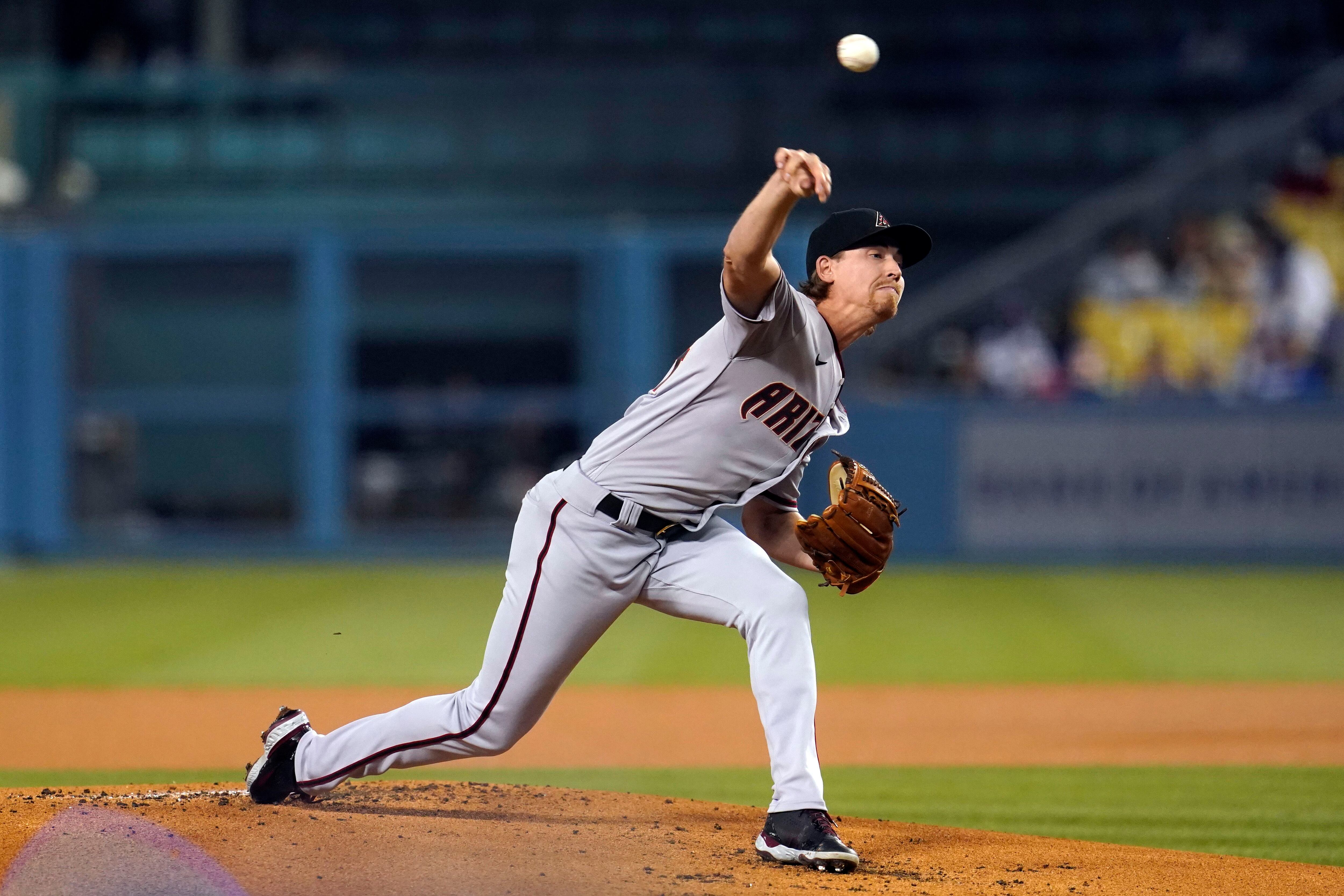 Dodgers clinch postseason berth in 8-4 win over D-backs - The San