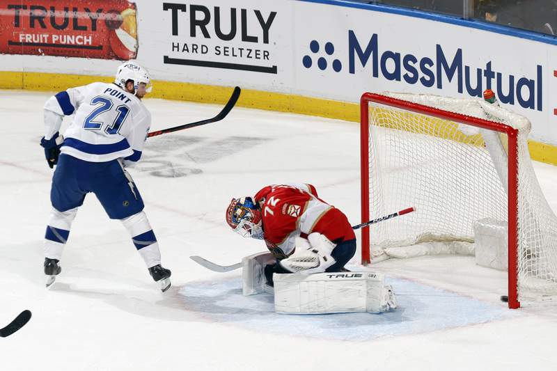 Point scores 2 in 3rd to lift Lightning over Panthers 5-4 in Game 1