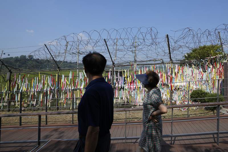 N. Korea shows off civil defense units in toned-down parade