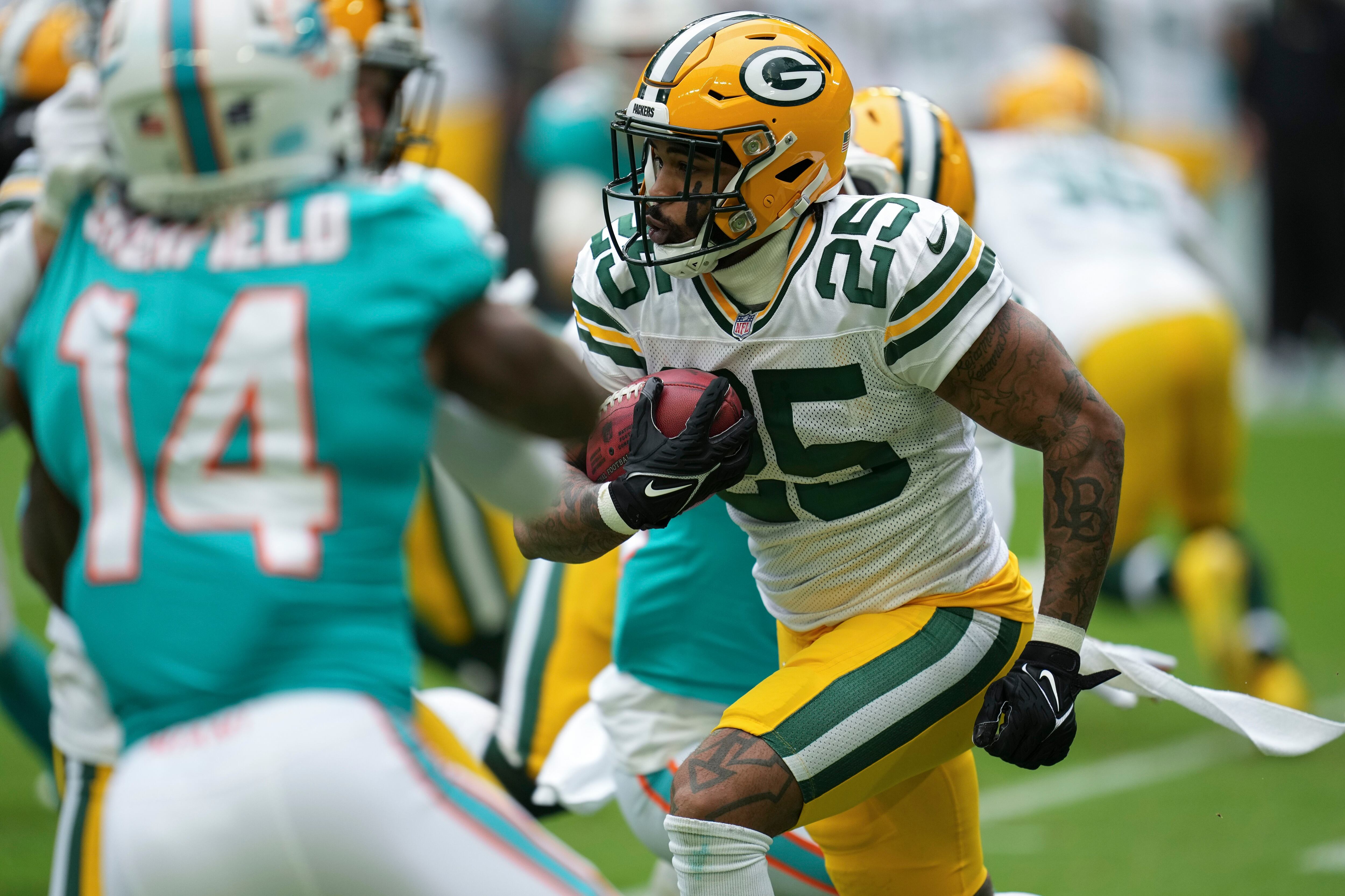 AJ Dillon helps Packers earn chilly win over Rams