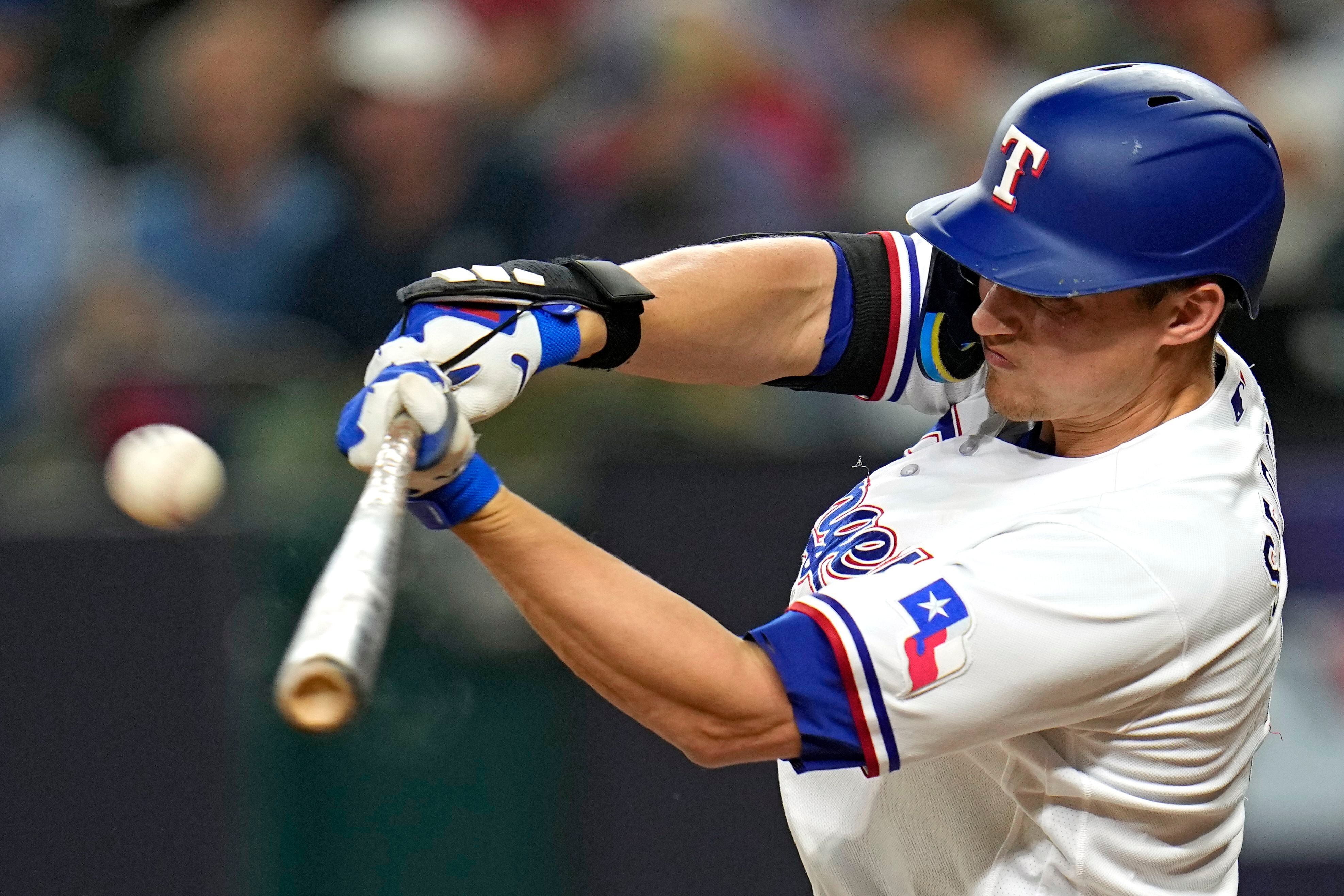 Corey Seager removed from Rangers game vs. Dodgers after awkward slide into  second