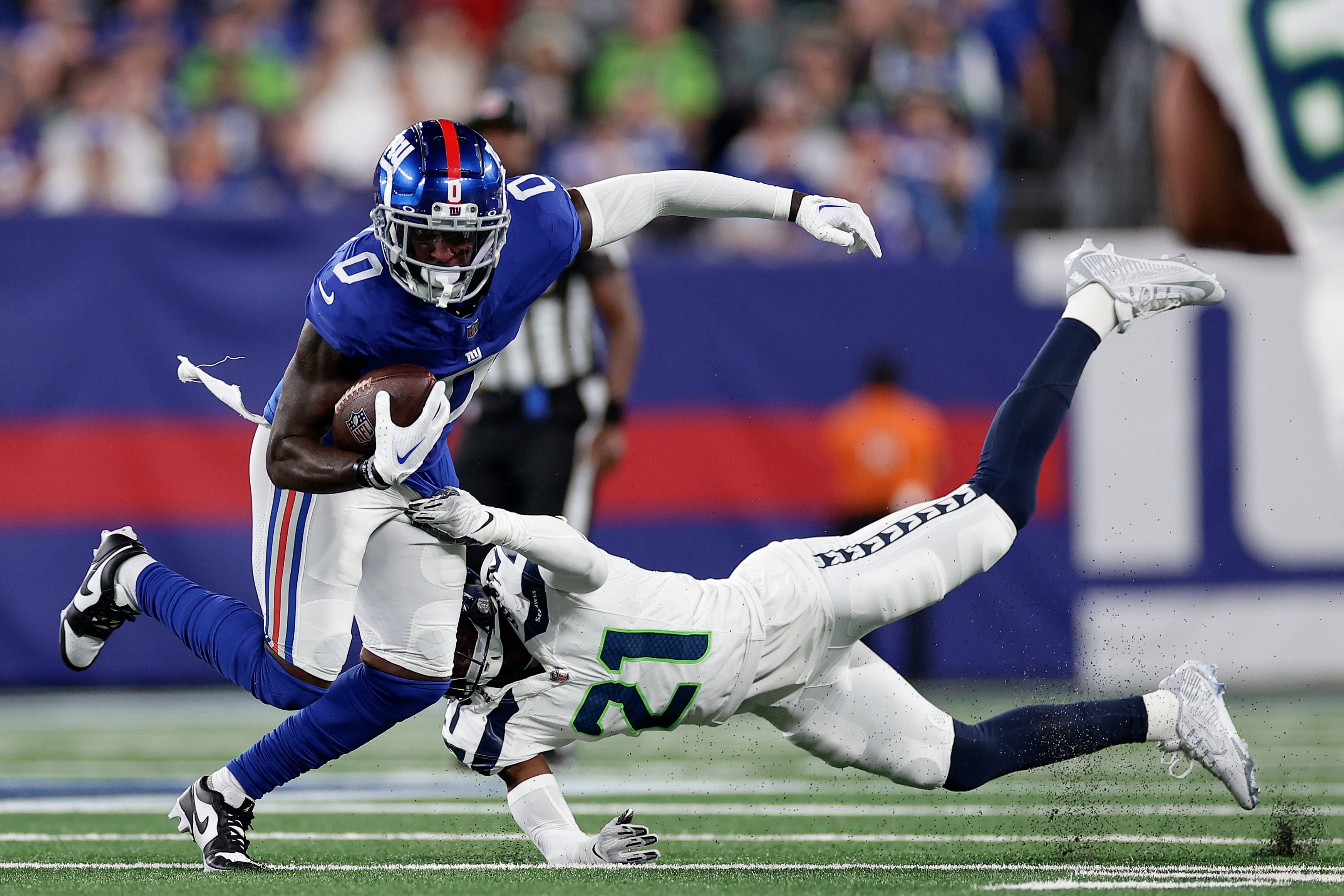 Rookie Devon Witherspoon scores on 97-yard pick-6 as Seahawks' defense  leads Seattle over Giants