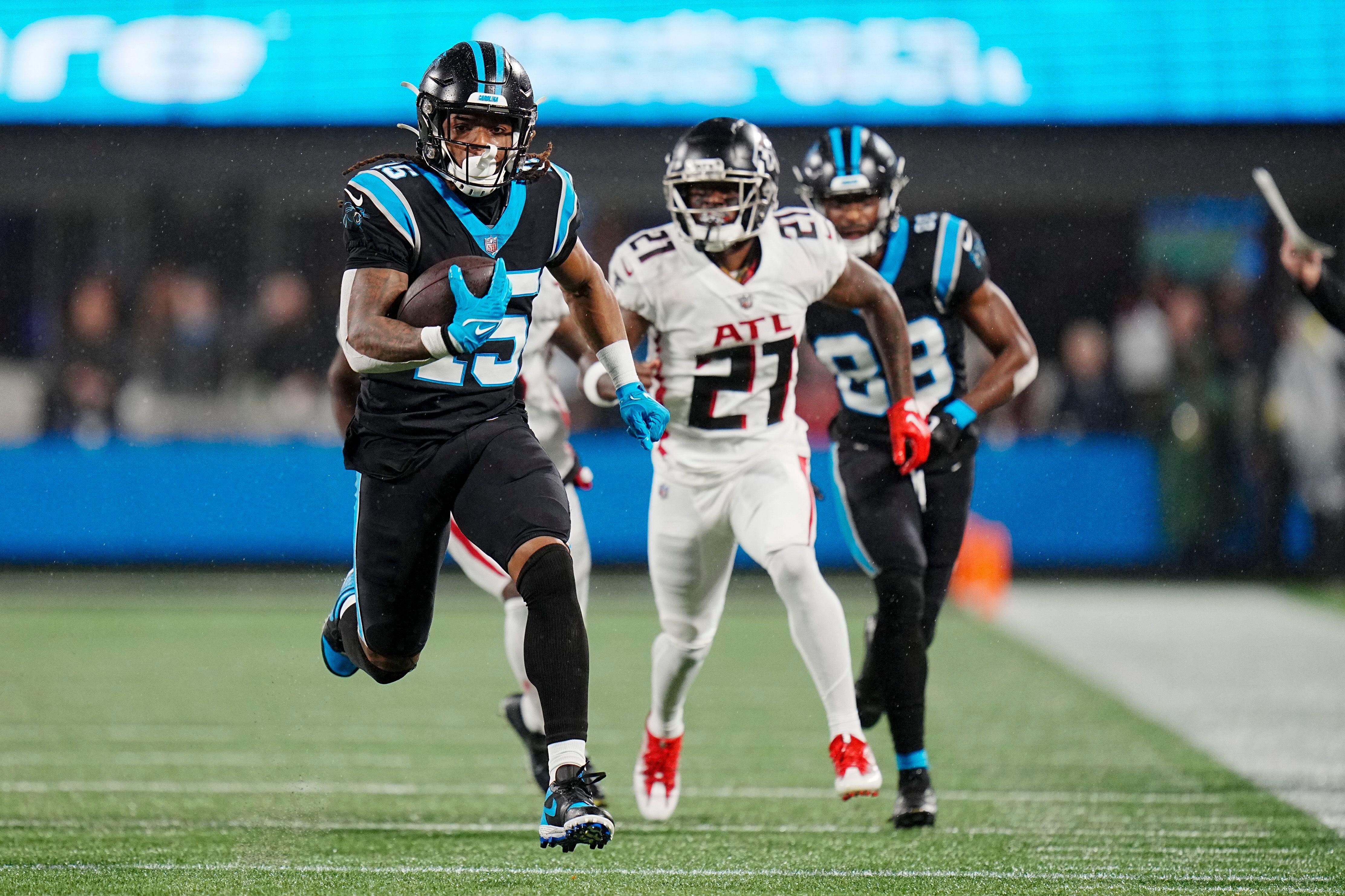 Foreman leads Panthers past rival Falcons in rain, 25-15