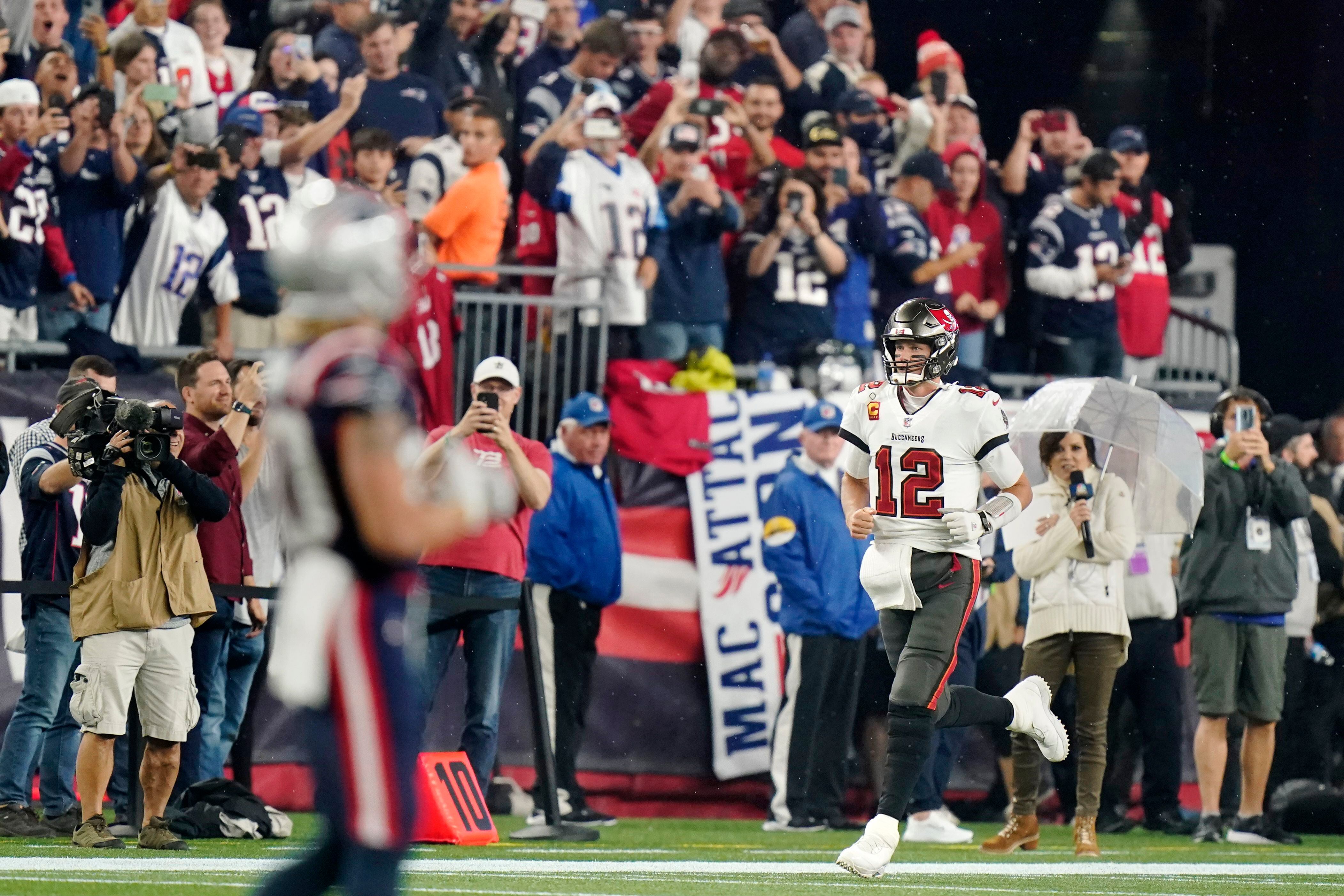 Brady gets win, passing yards record in return to Gillette