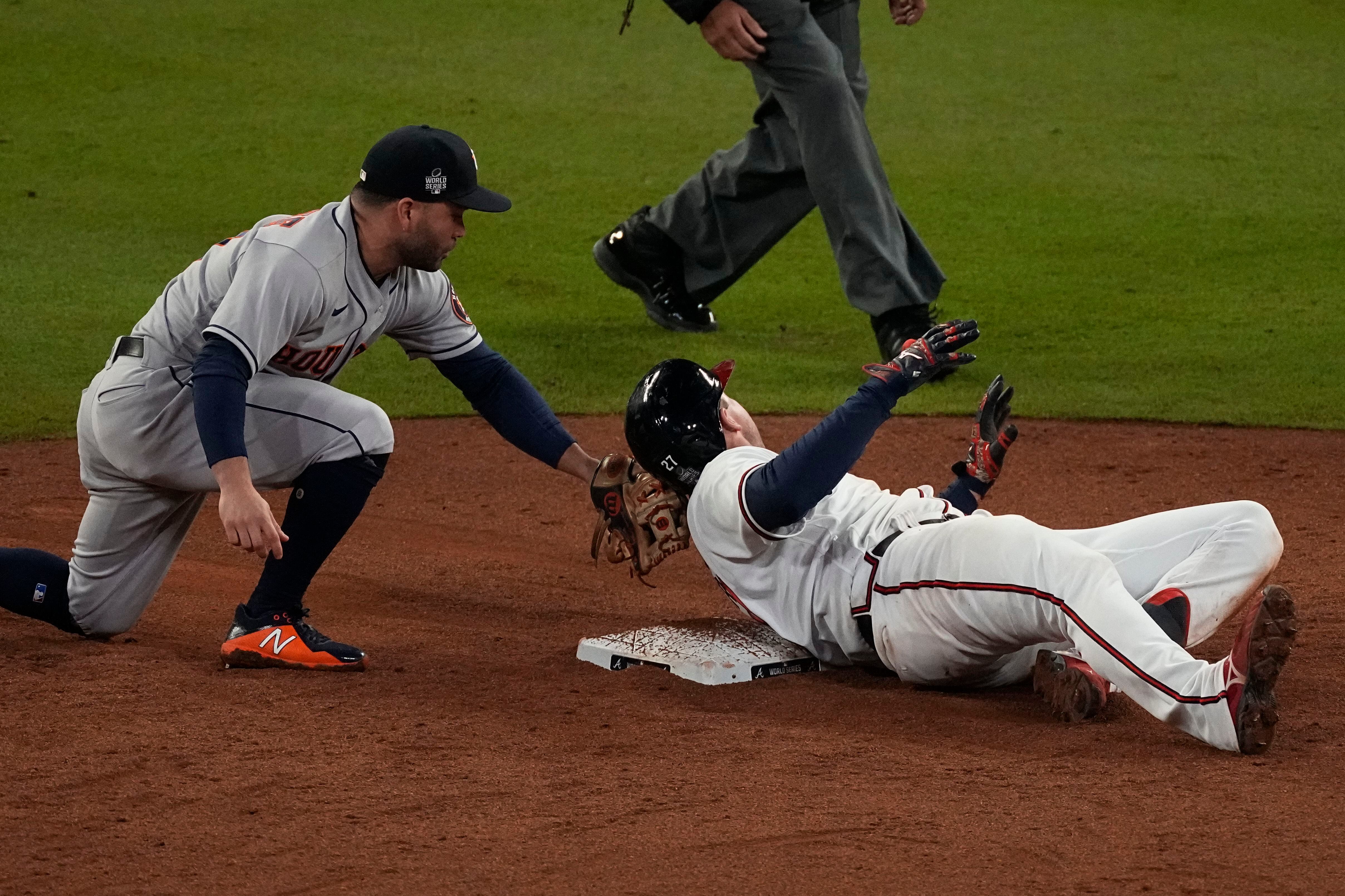 Unlikely hero, 2 HRs carry Braves to brink of Series title