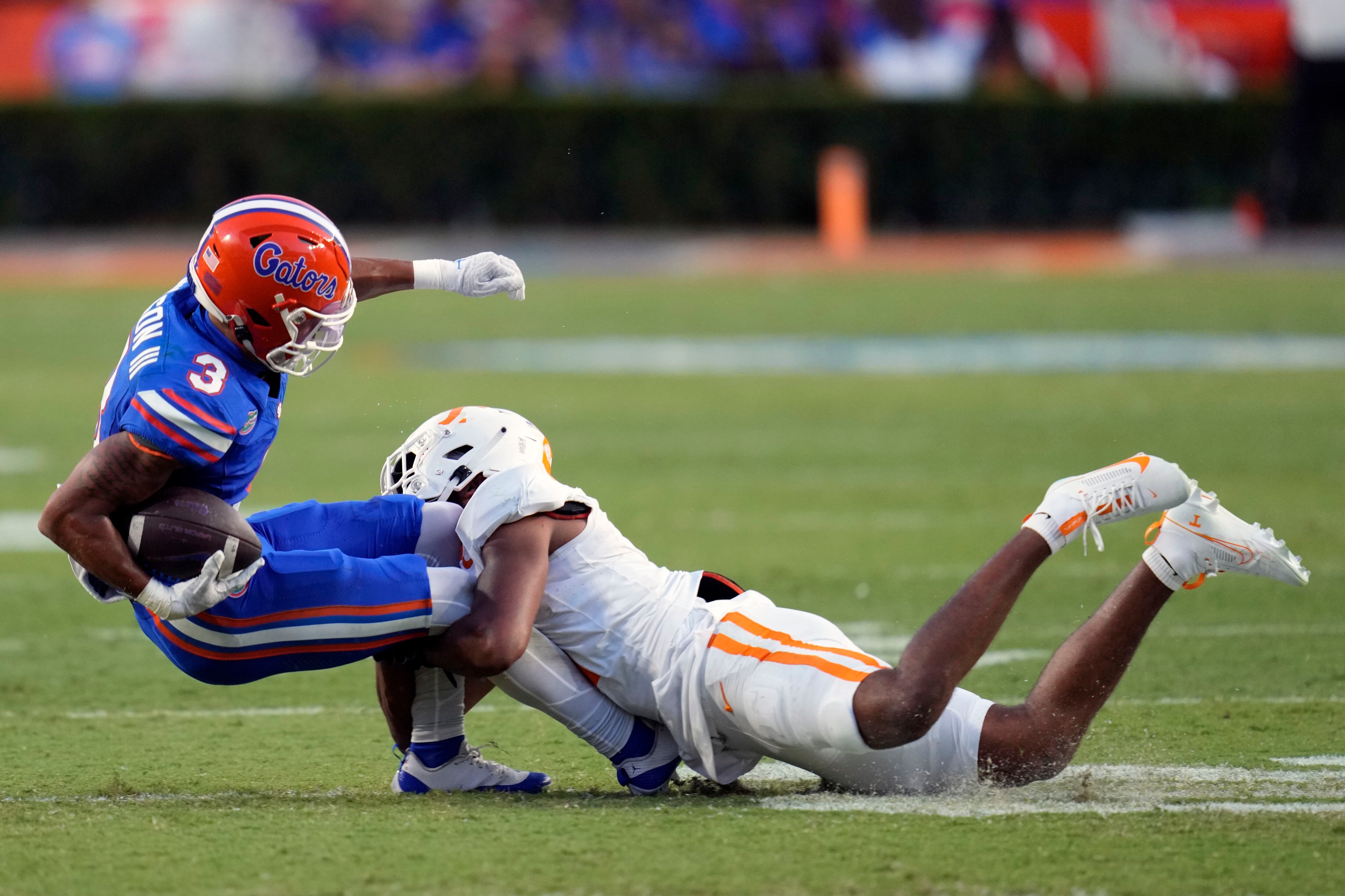 LOOK: Florida Gators honor 25 years of 'The Swamp' with green scale  alternate uniforms