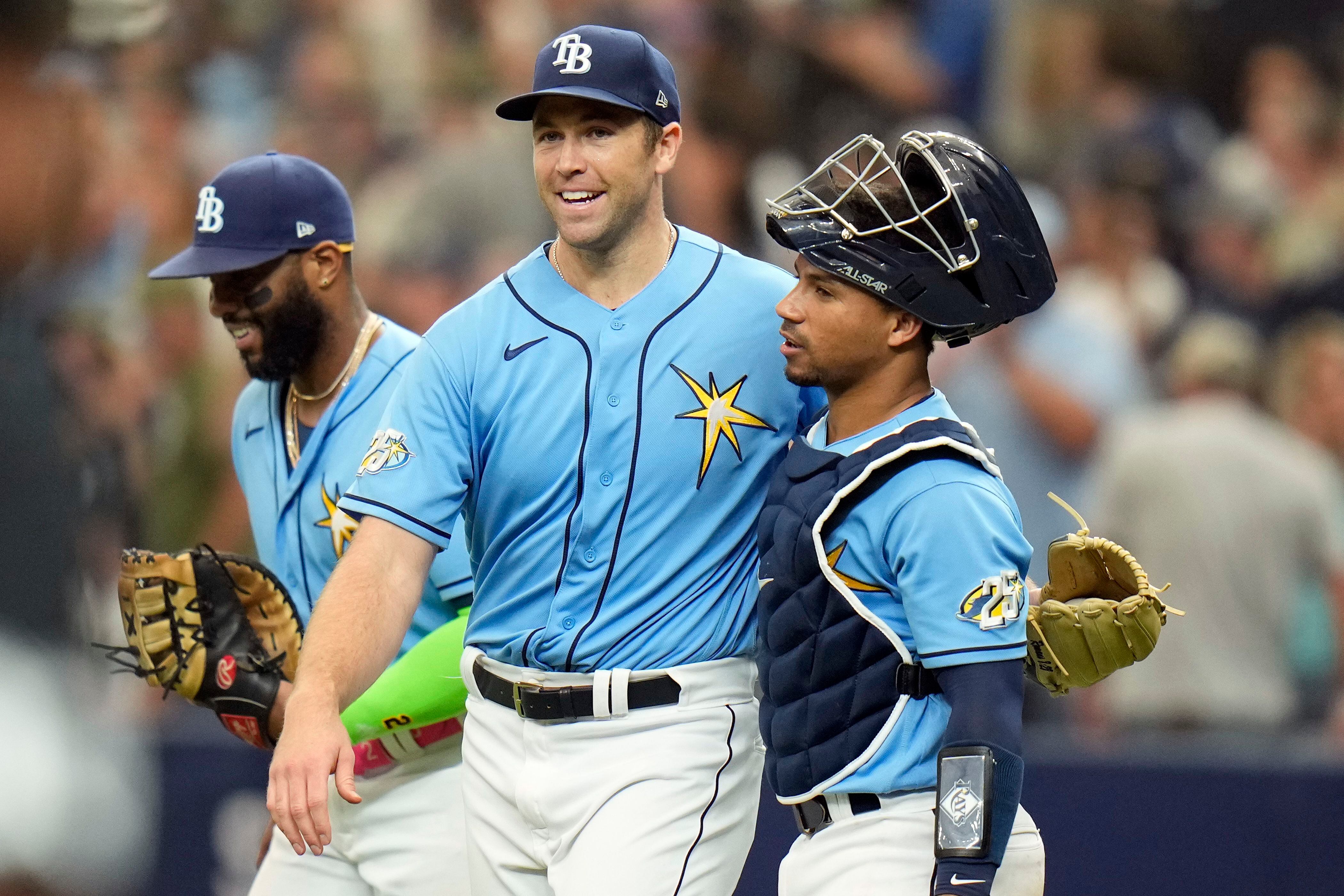 Wander Franco of the Rays hustles down to first base during the