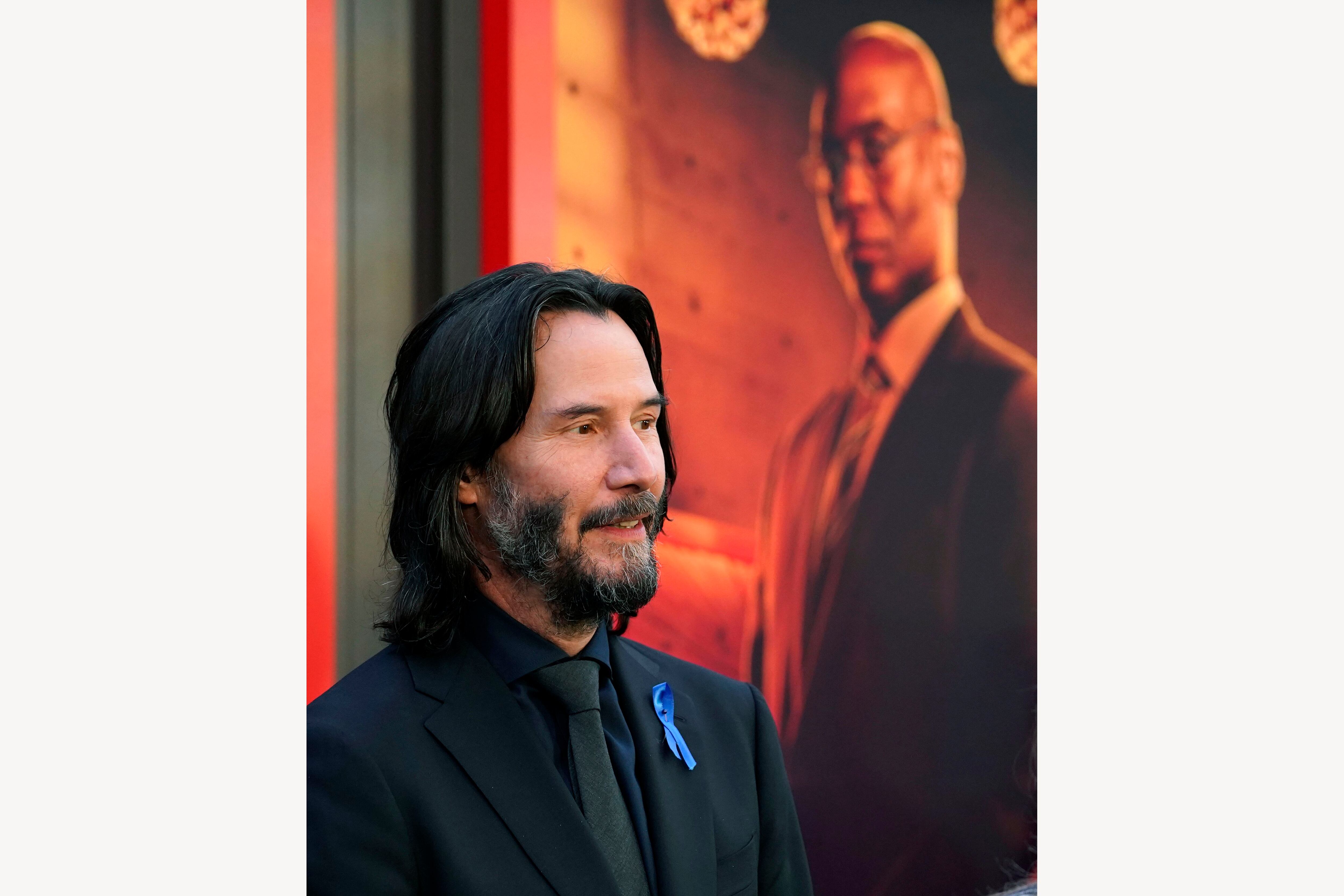 Why Keanu Reeves wore blue ribbon to 'John Wick 4' premiere - Los Angeles  Times