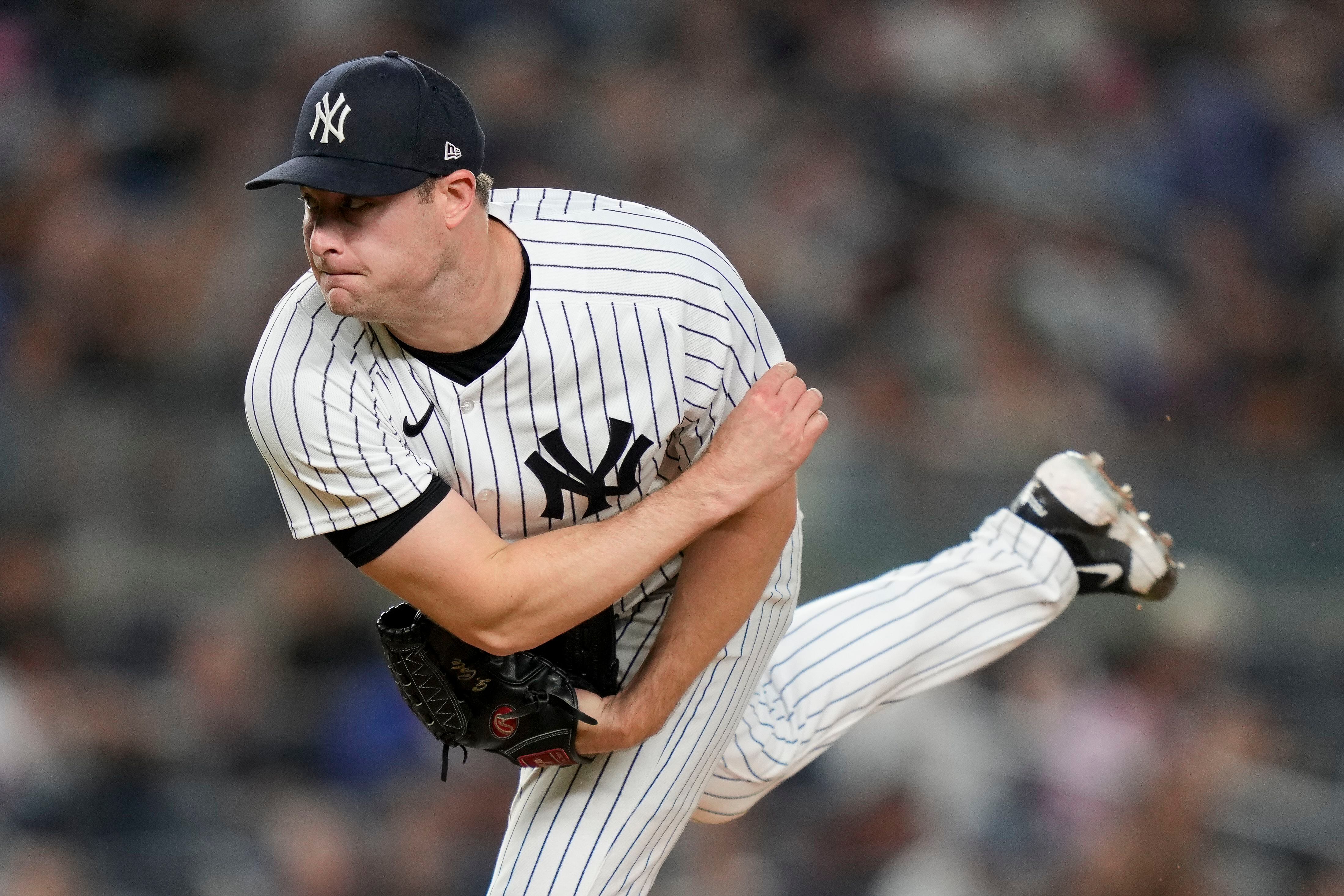 Wagging his finger at the Mariners, Cole stops the Yankees' 4-game