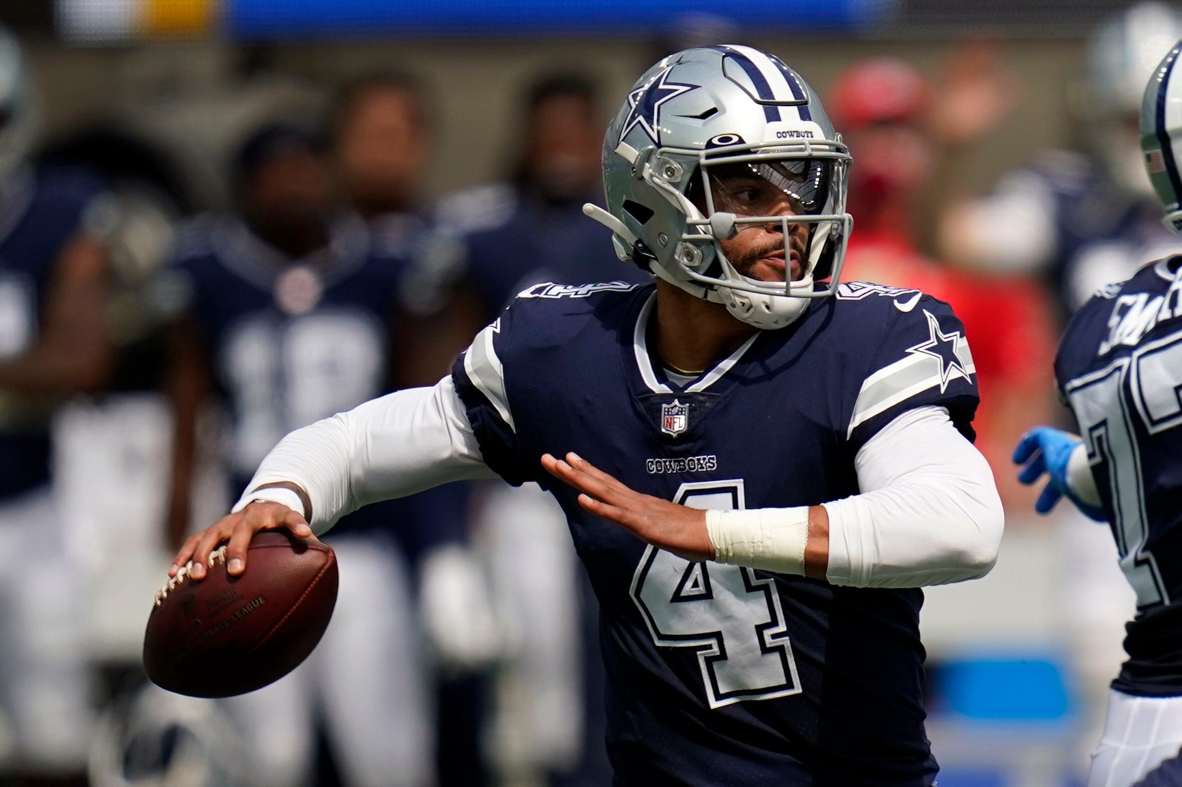 Running back (20) Tony Pollard of the Dallas Cowboys runs and scores a  touchdown against the Los Angeles Chargers in an NFL football game, Sunday,  Sept. 19, 2021, in Inglewood, Calif. The