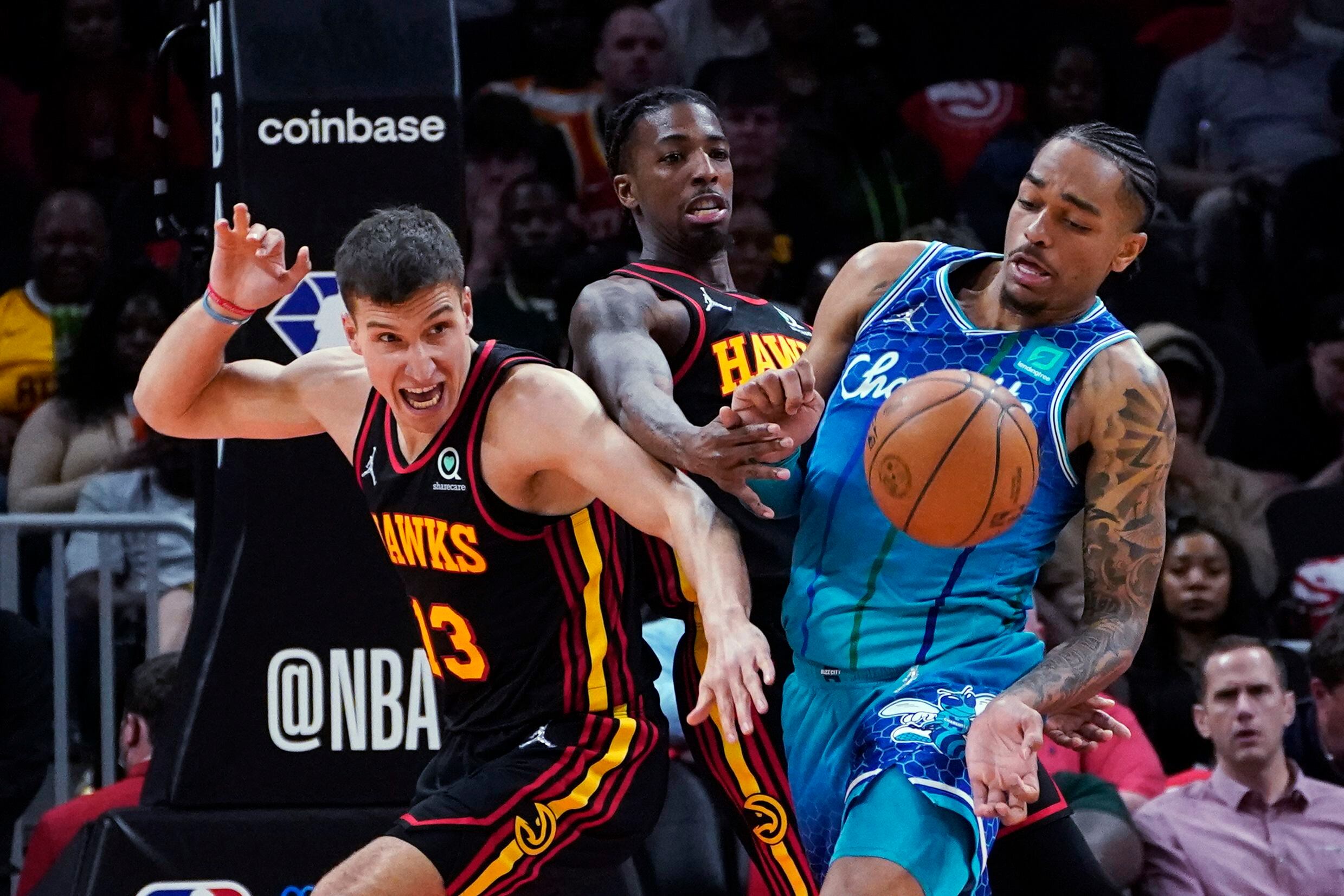 Atlanta Hawks guard Bogdan Bogdanovic (13) shoots the ball against